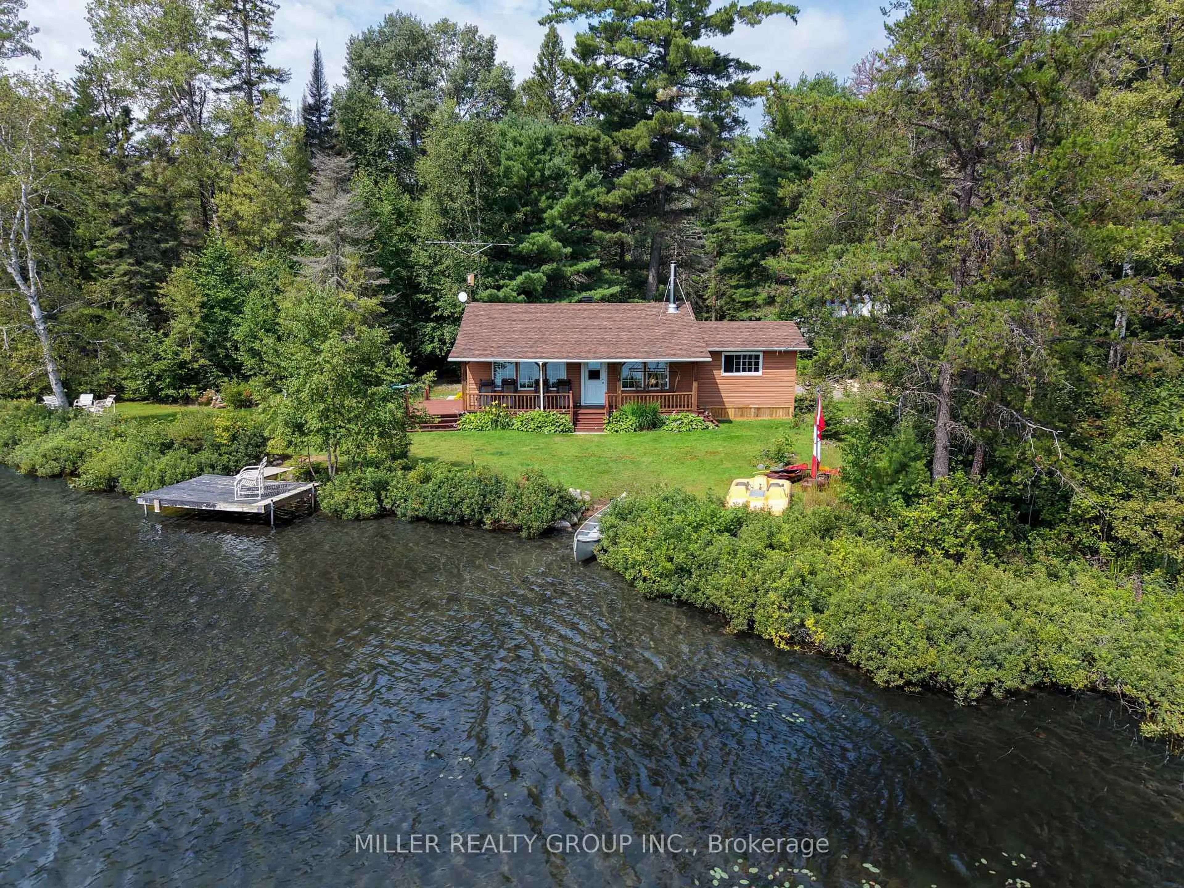 A pic from outside/outdoor area/front of a property/back of a property/a pic from drone, water/lake/river/ocean view for 7122 Twin Lakes Rd C-3 Rd, Timiskaming Ontario P0J 1P0