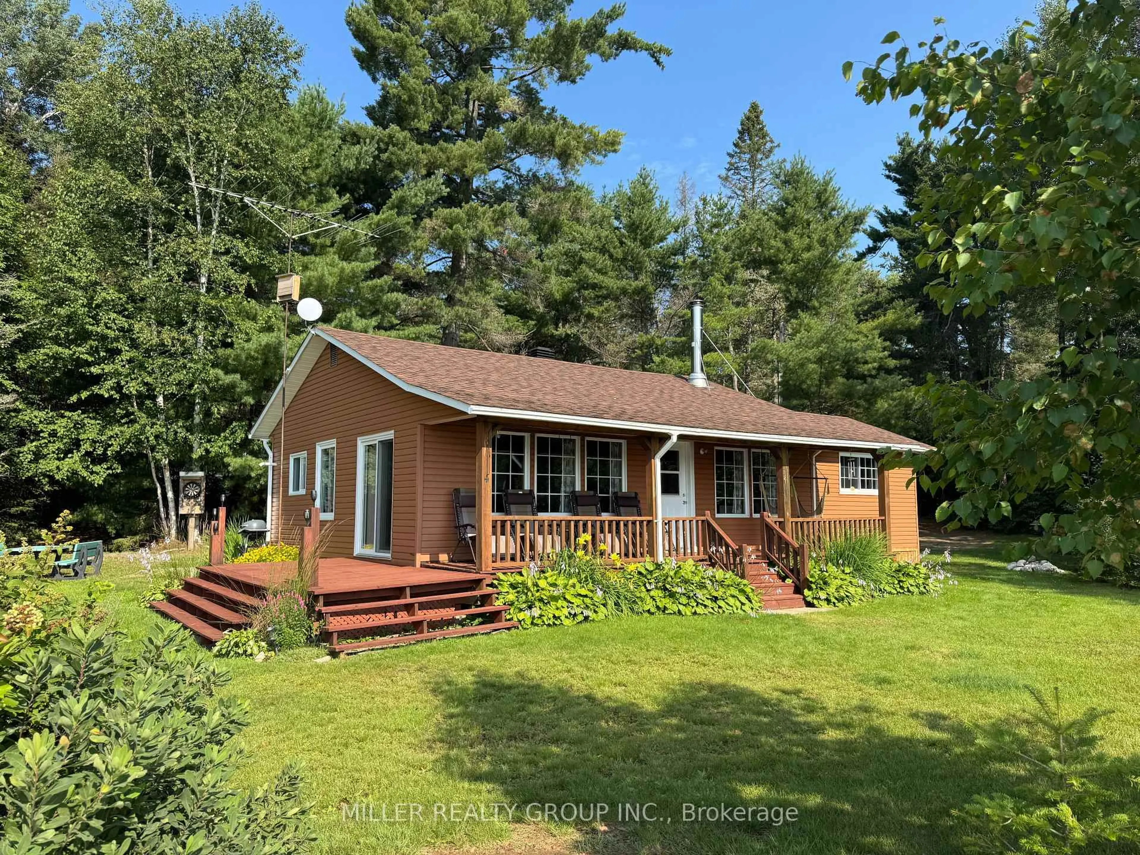 A pic from outside/outdoor area/front of a property/back of a property/a pic from drone, water/lake/river/ocean view for 7122 Twin Lakes Rd C-3 Rd, Timiskaming Ontario P0J 1P0