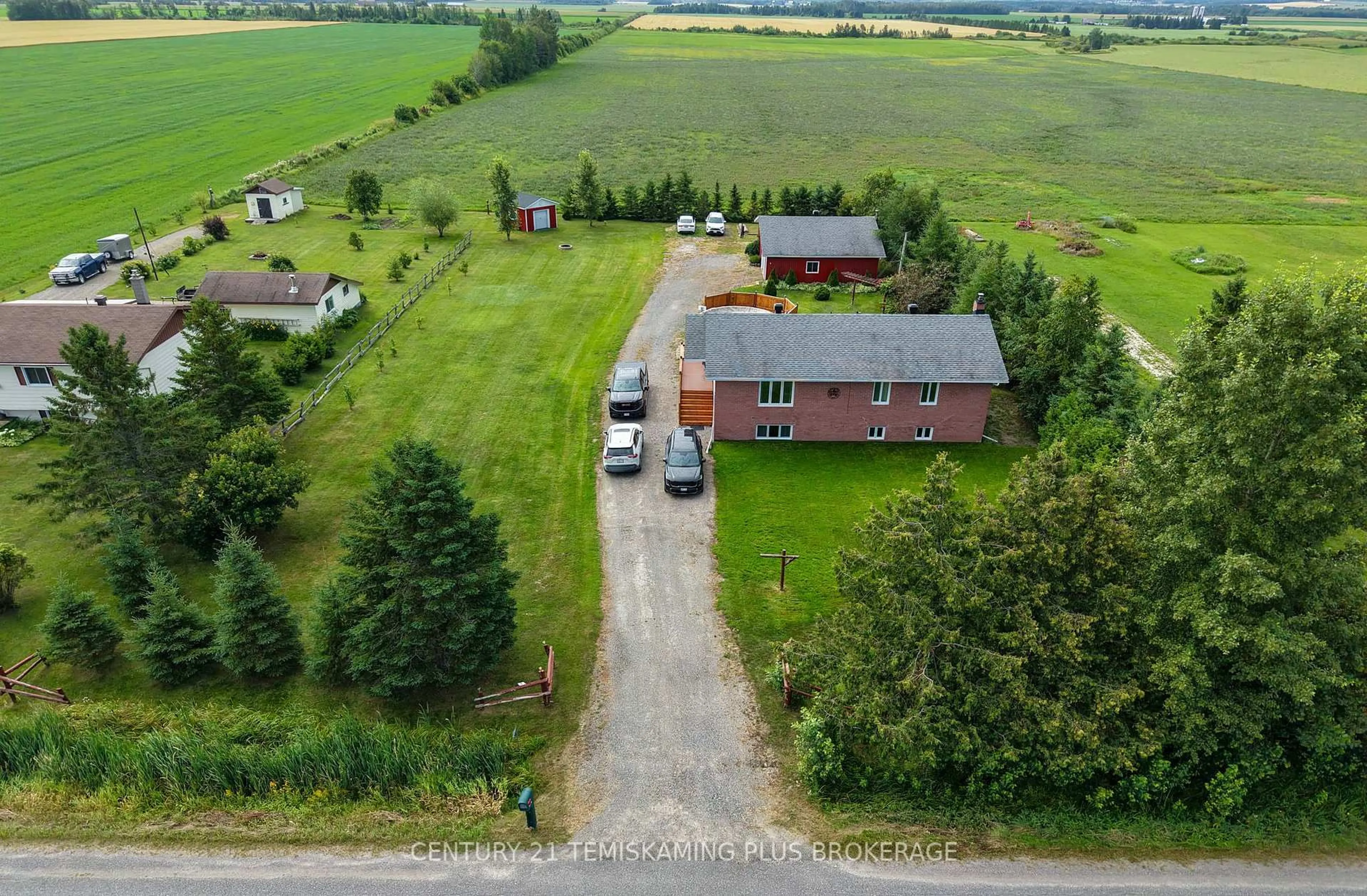 A pic from outside/outdoor area/front of a property/back of a property/a pic from drone, unknown for 045090 Highway 562, Timiskaming Ontario P0J 1S0