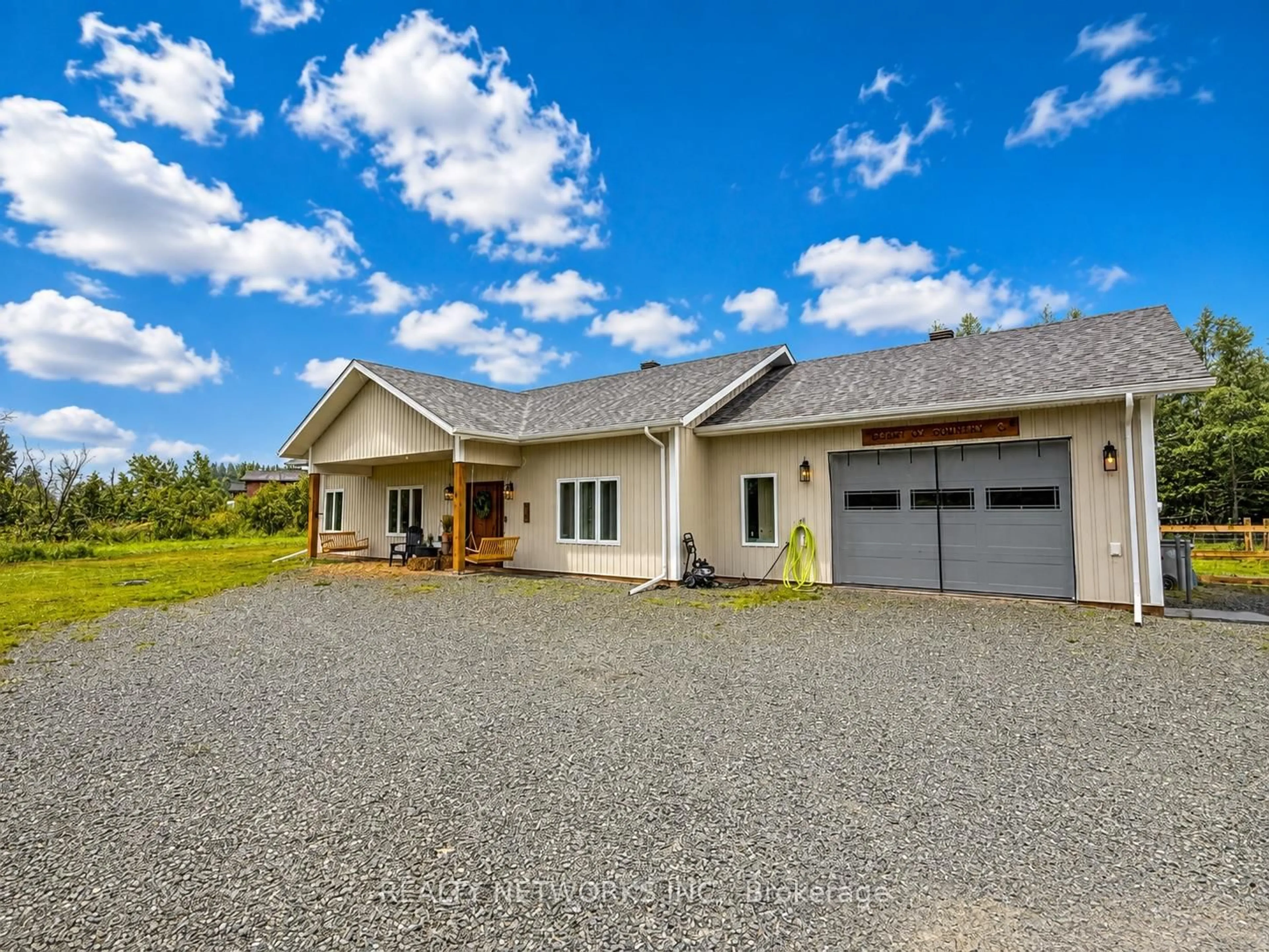 A pic from outside/outdoor area/front of a property/back of a property/a pic from drone, unknown for 923 Jaguar Dr, Timmins Ontario P4R 0G9