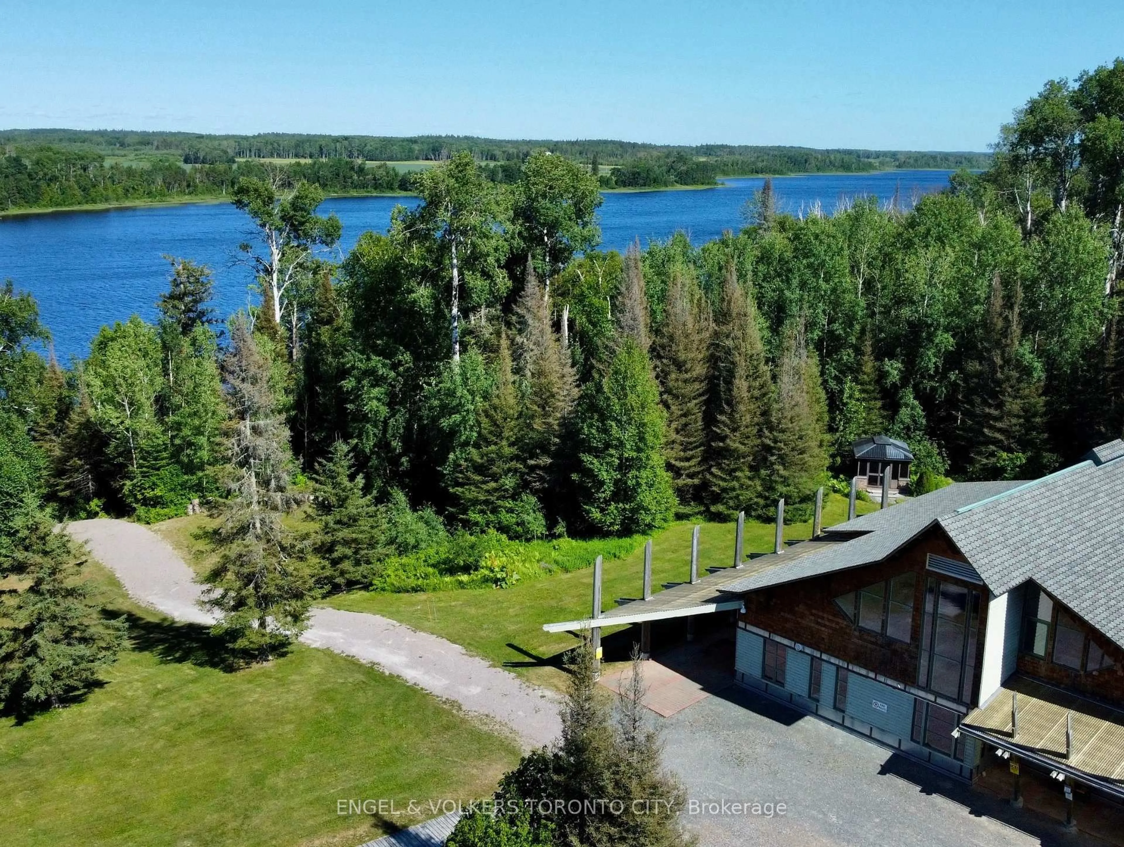 A pic from outside/outdoor area/front of a property/back of a property/a pic from drone, water/lake/river/ocean view for 100 Ontario St, Timiskaming Ontario P0J 1G0