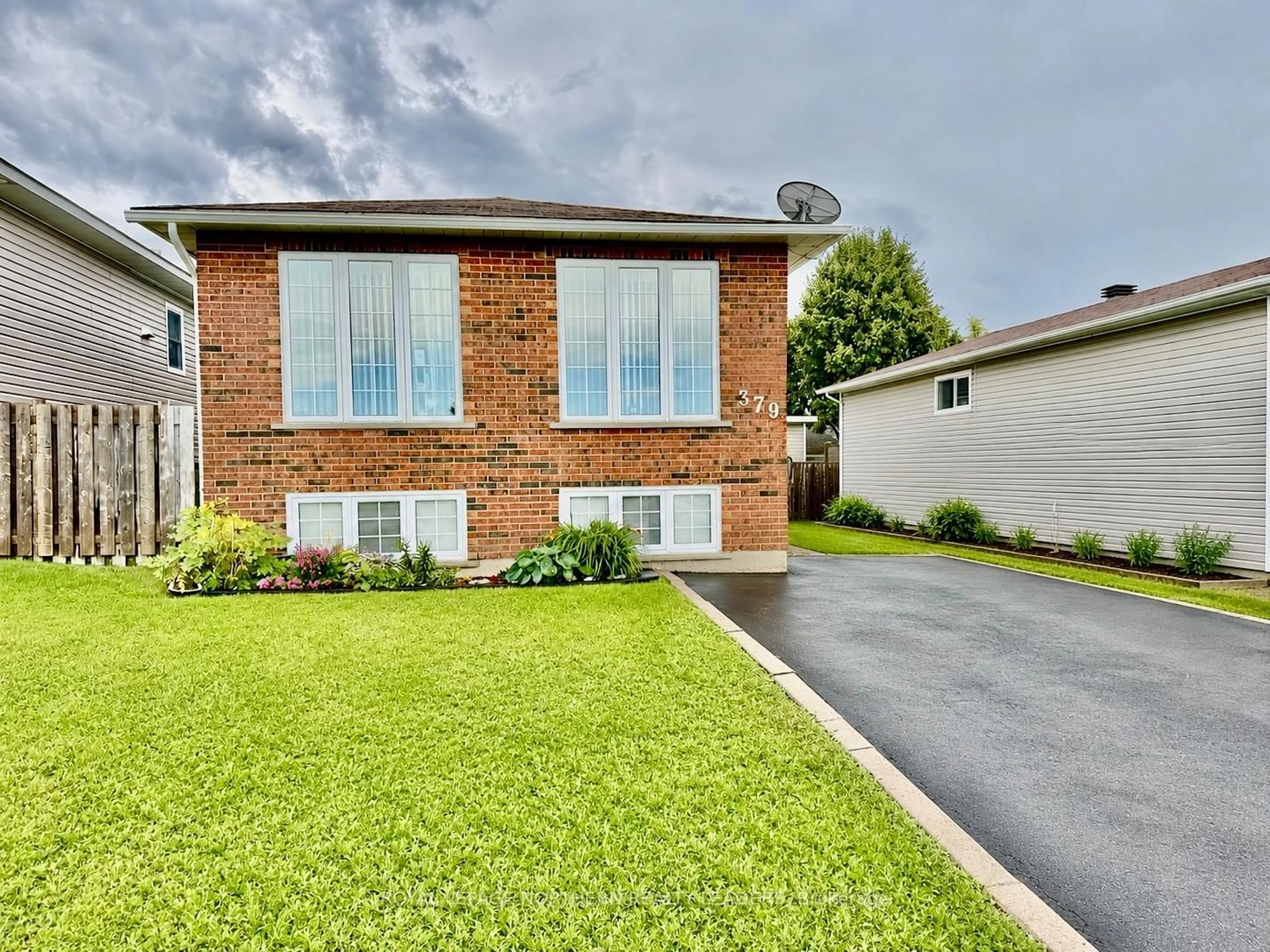 Home with brick exterior material, street for 379 Lonergan Blvd, Timmins Ontario P4P 1E2