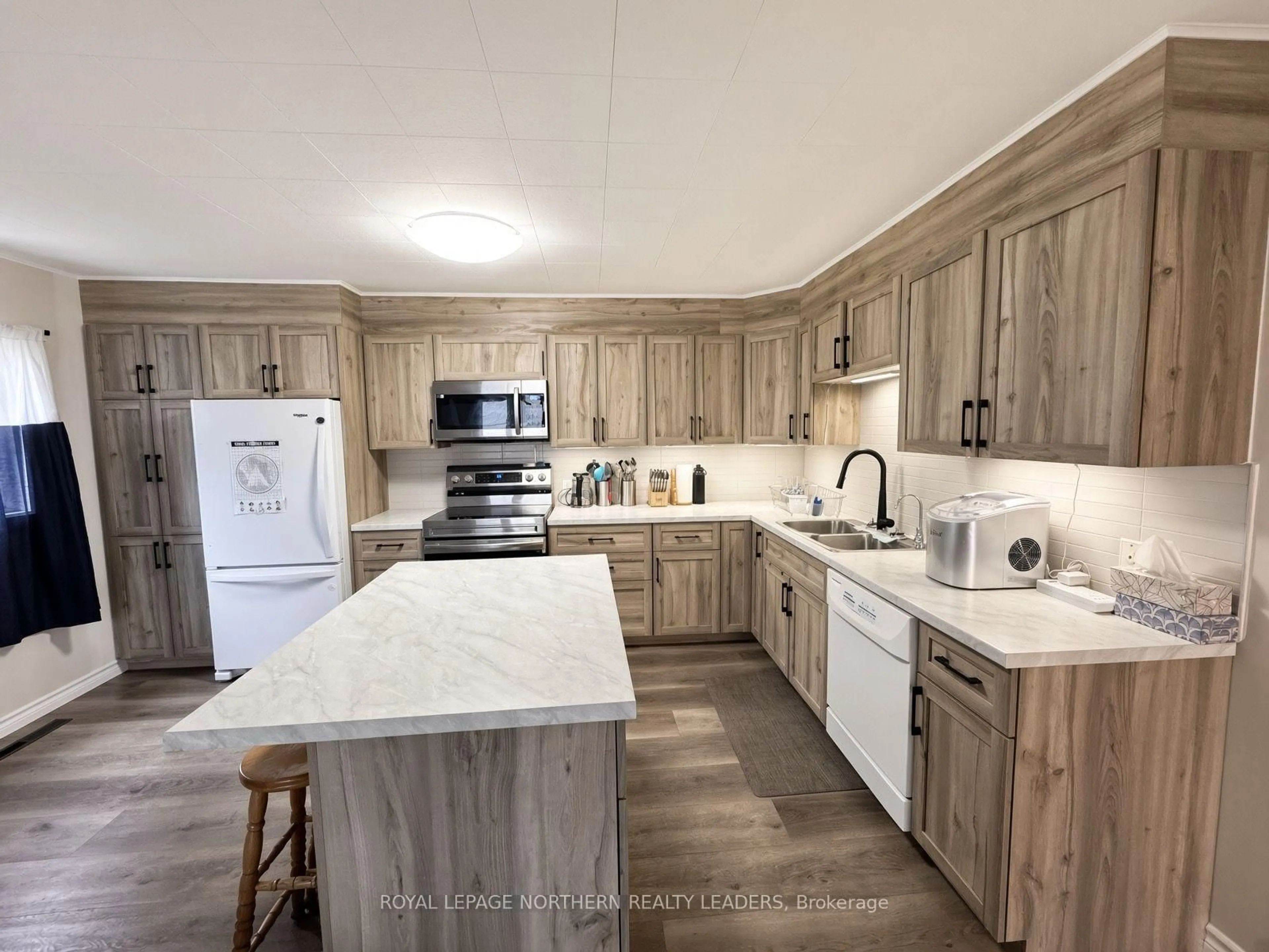Open concept kitchen, unknown for 53 Columbus Ave, Timmins Ontario P4N 3H2
