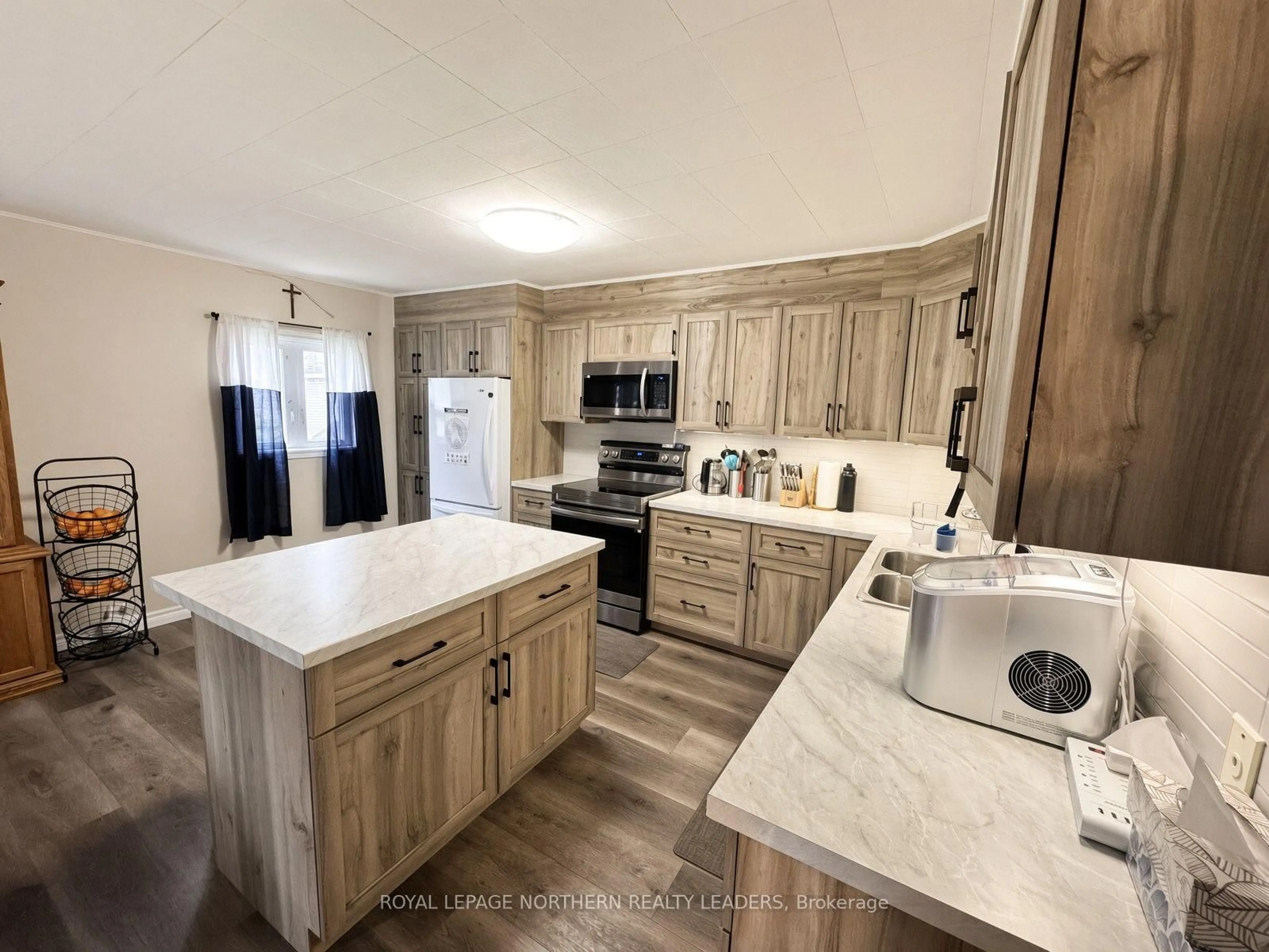 Open concept kitchen, unknown for 53 Columbus Ave, Timmins Ontario P4N 3H2