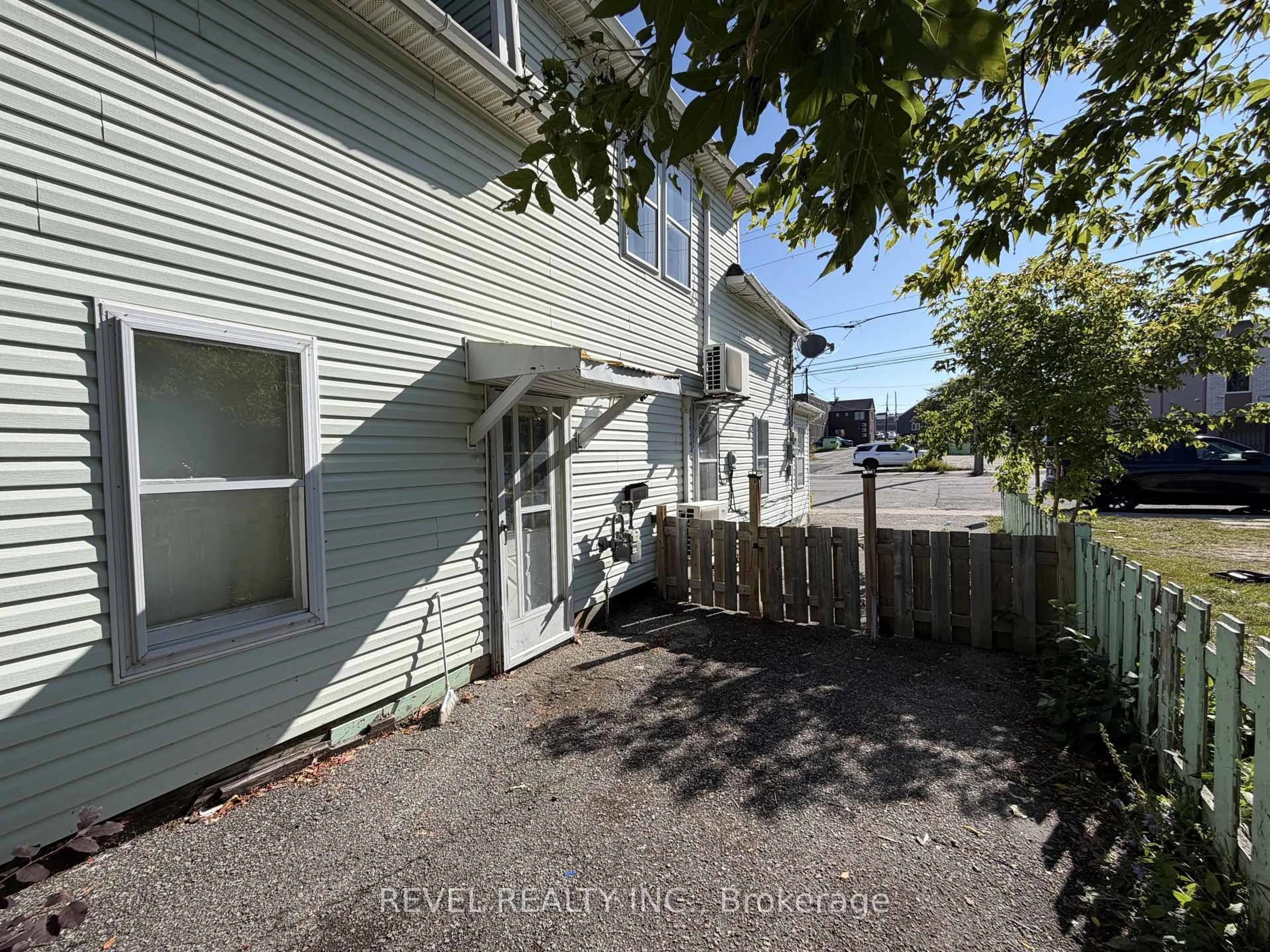 A pic from outside/outdoor area/front of a property/back of a property/a pic from drone, water/lake/river/ocean view for 21 Birch St, Timmins Ontario P4N 2A4