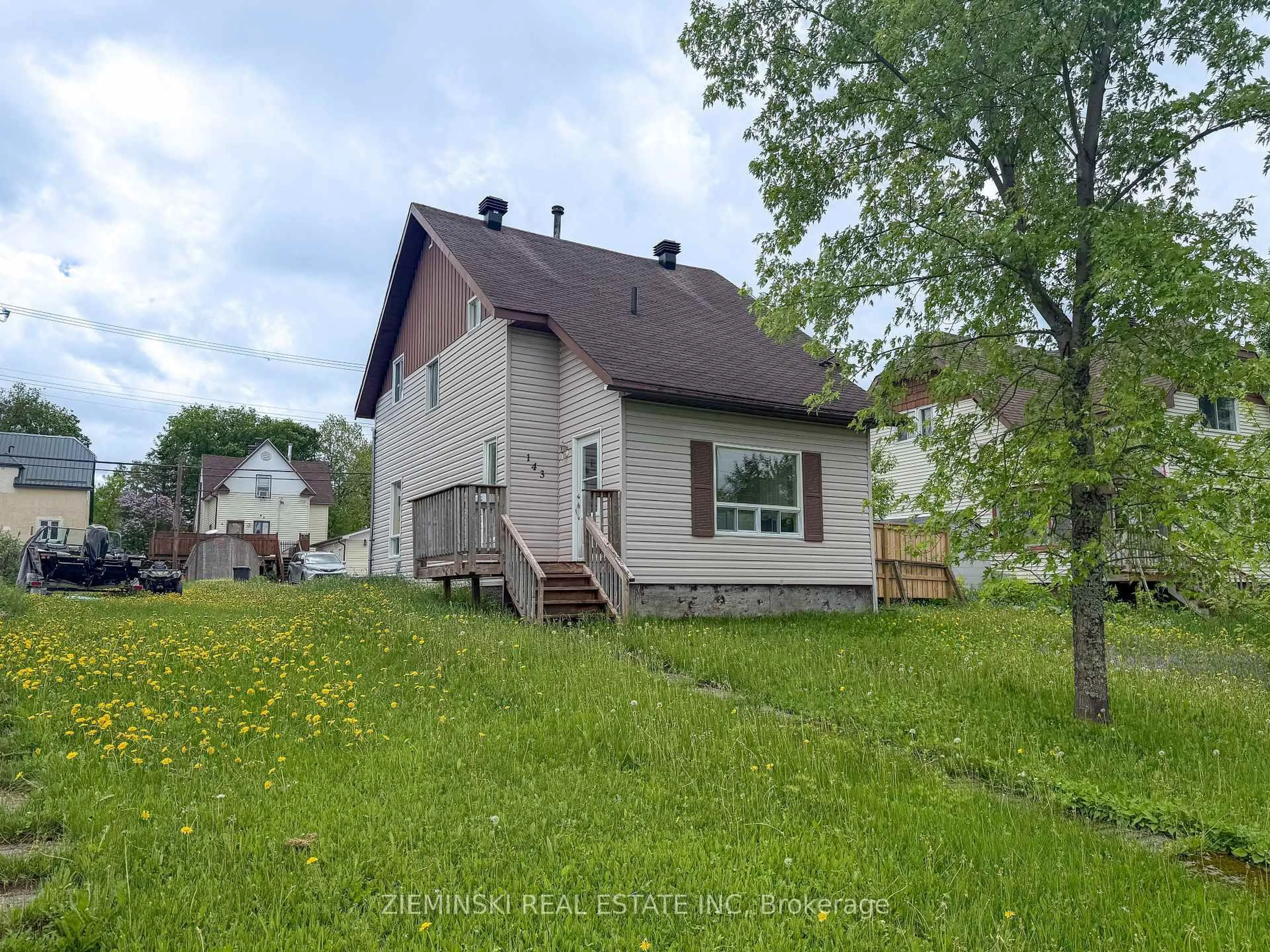 A pic from outside/outdoor area/front of a property/back of a property/a pic from drone, street for 143 Essex Ave, Iroquois Falls Ontario P0K 1E0