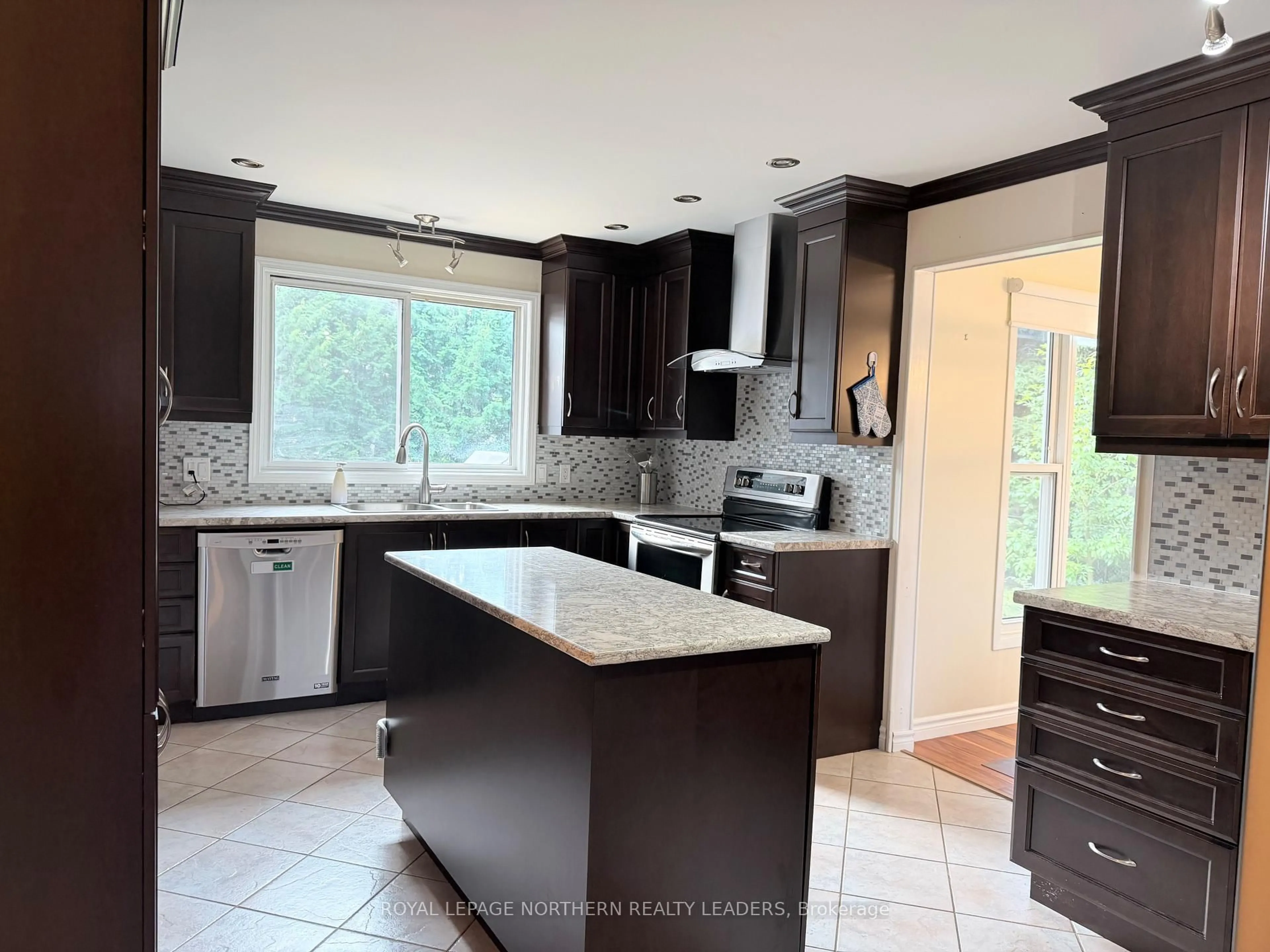 Open concept kitchen, ceramic/tile floor for 441 Ross Ave, Timmins Ontario P4N 5X5