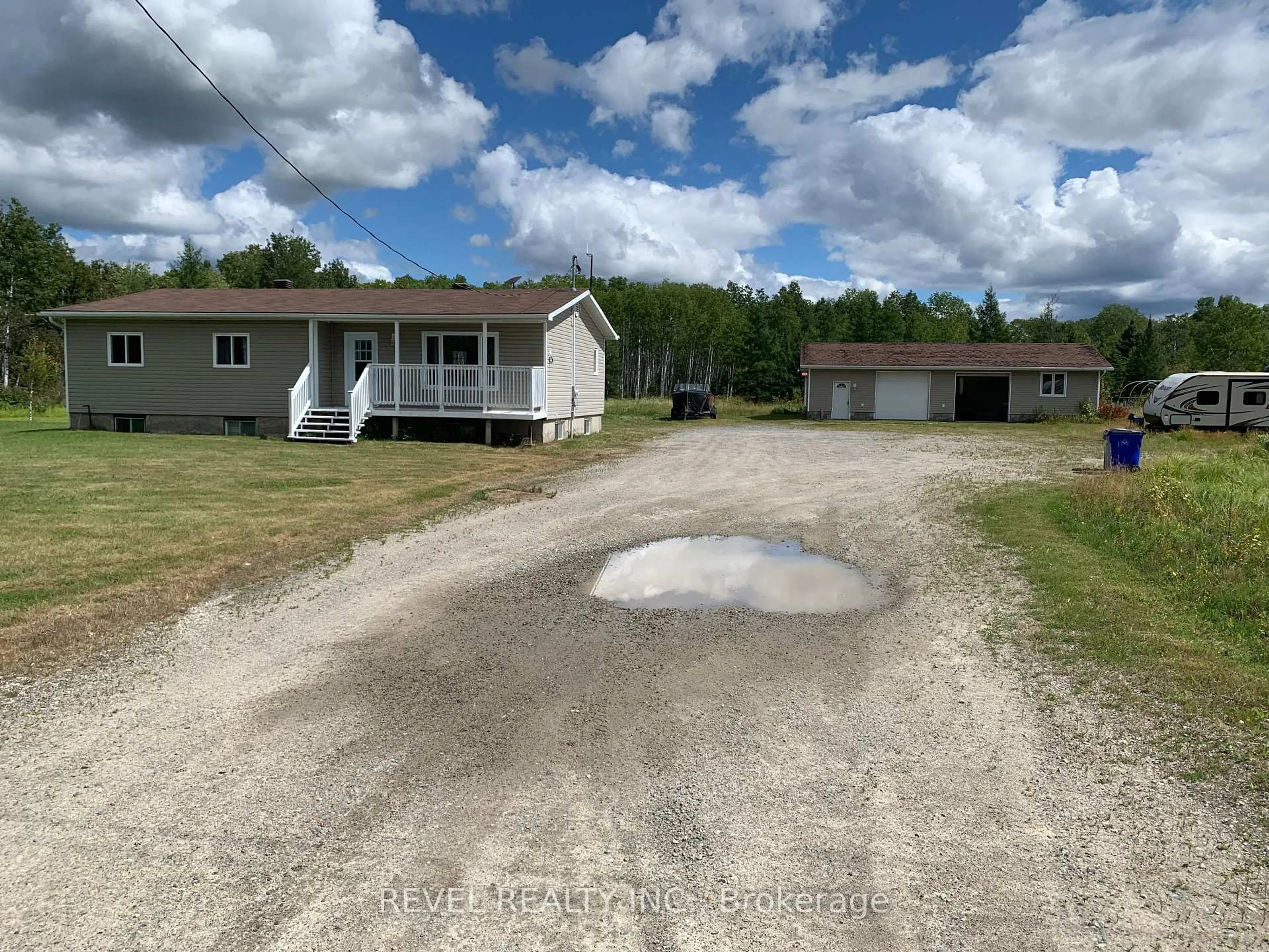 A pic from outside/outdoor area/front of a property/back of a property/a pic from drone, unknown for 1040 Mahoney Rd, Timmins Ontario P4R 0H6