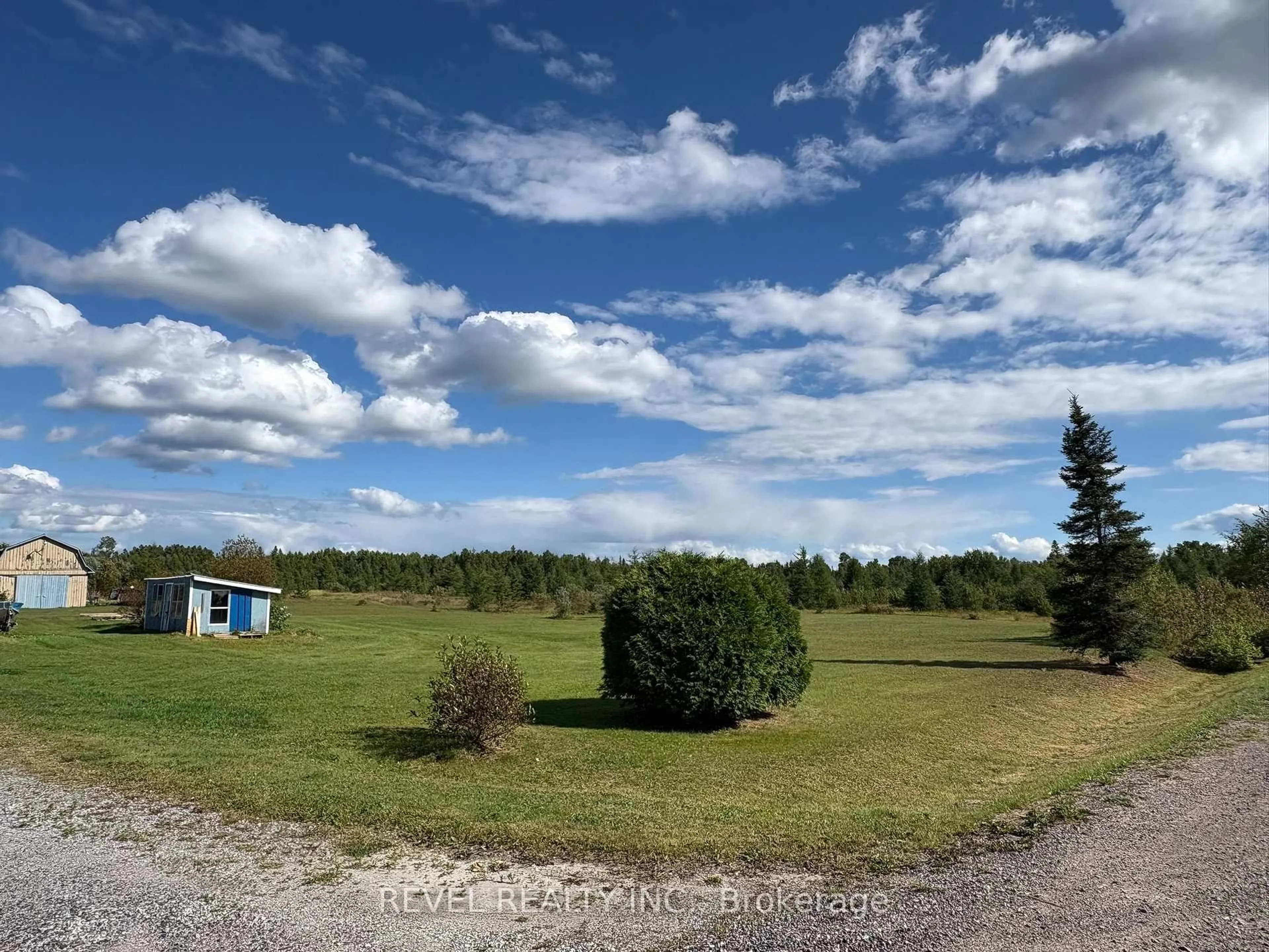 A pic from outside/outdoor area/front of a property/back of a property/a pic from drone, forest/trees view for 641 Thomas Rd #(Fauquier), Kapuskasing Ontario P0L 1G0