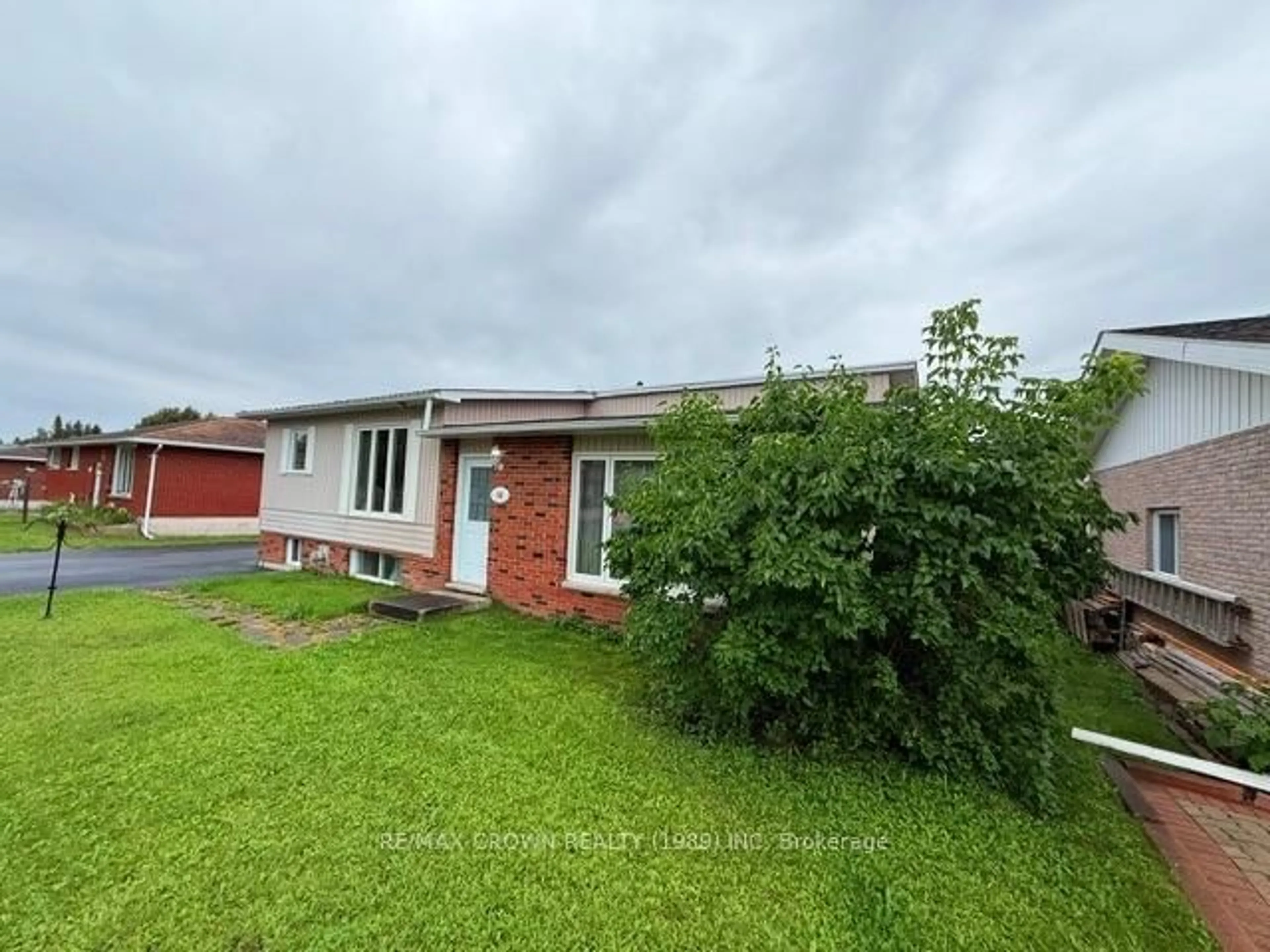 A pic from outside/outdoor area/front of a property/back of a property/a pic from drone, unknown for 16 Mateev Ave, Kapuskasing Ontario P5N 3E5