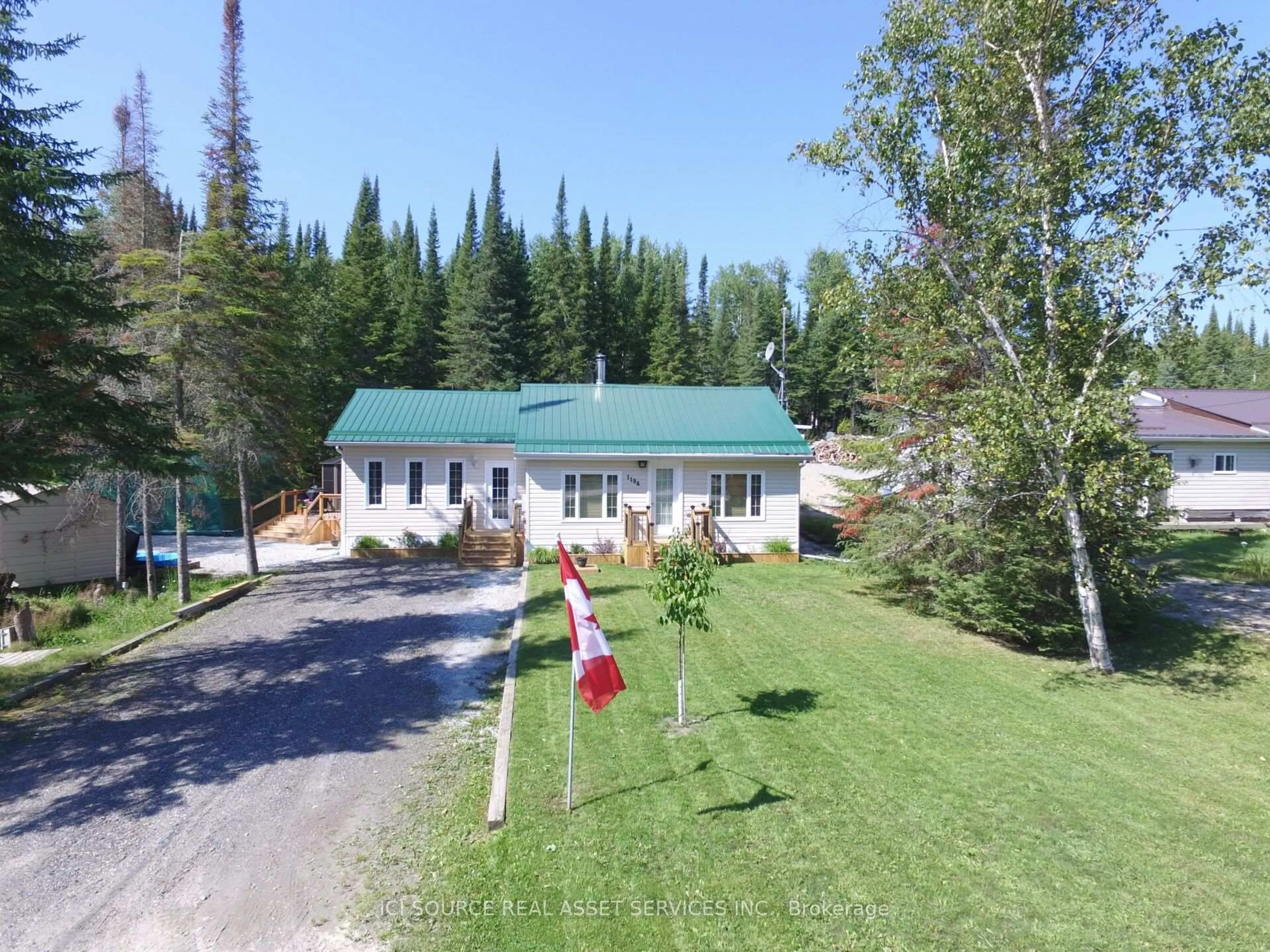 A pic from outside/outdoor area/front of a property/back of a property/a pic from drone, mountain view for 1186 Fantham Rd, Kapuskasing Ontario P0L 1G0