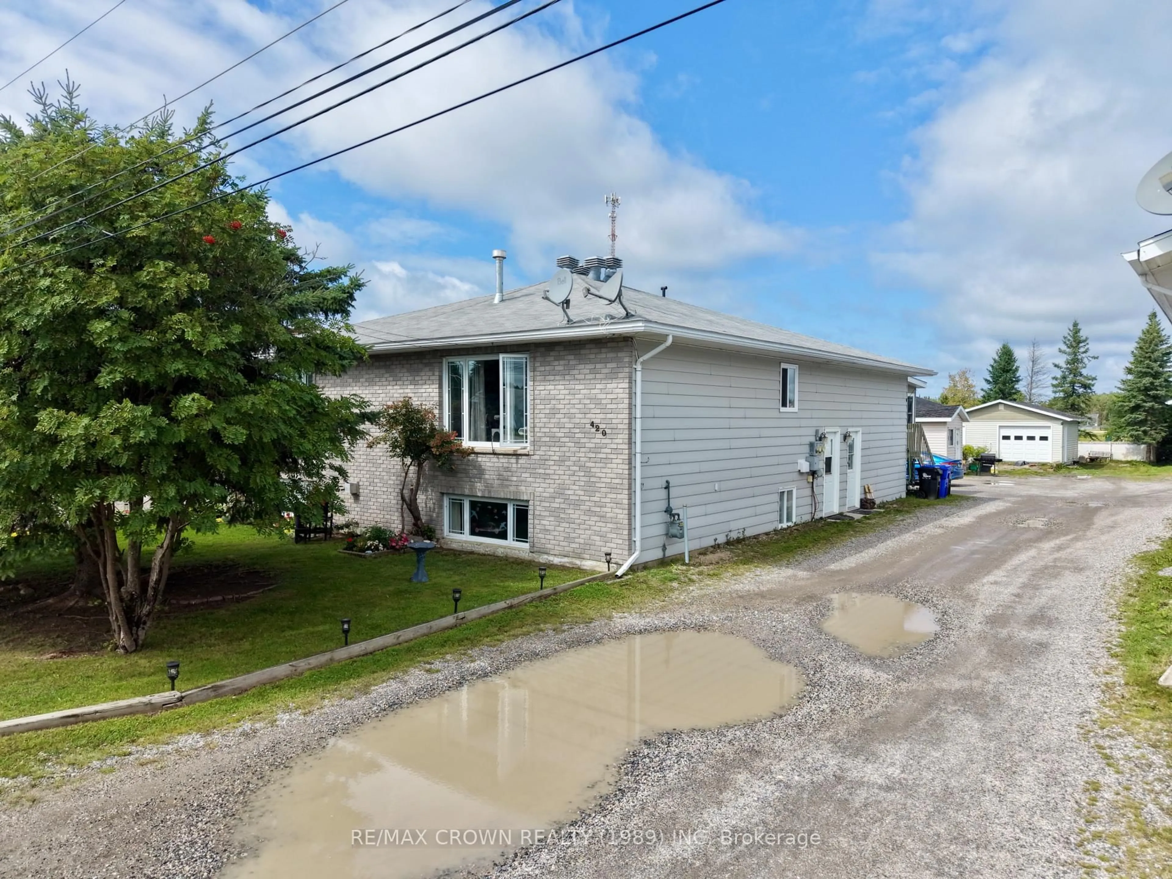 A pic from outside/outdoor area/front of a property/back of a property/a pic from drone, street for 420 Brisson Blvd, Hearst Ontario P0L 1N0
