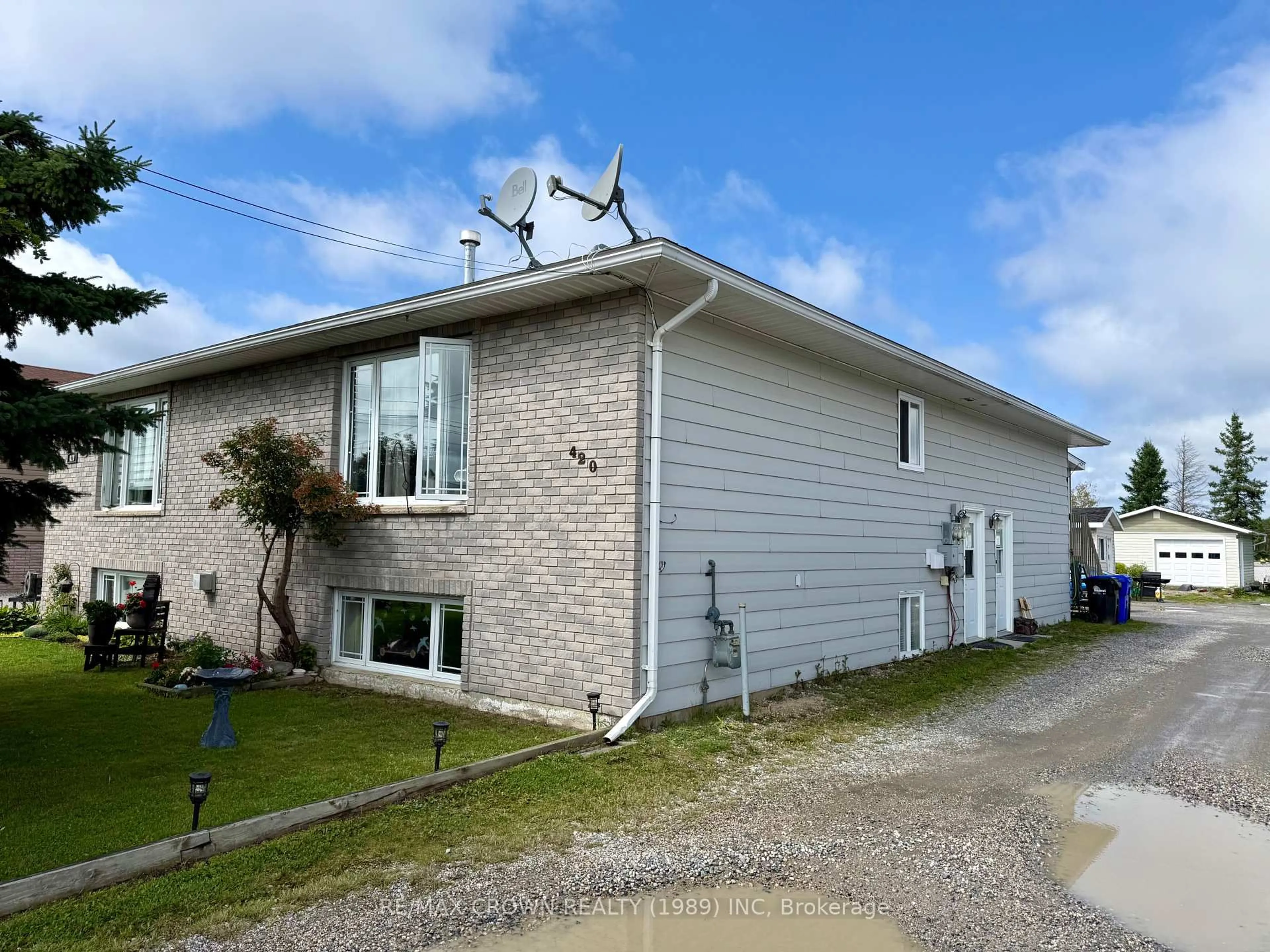 Home with vinyl exterior material, street for 420 Brisson Blvd, Hearst Ontario P0L 1N0