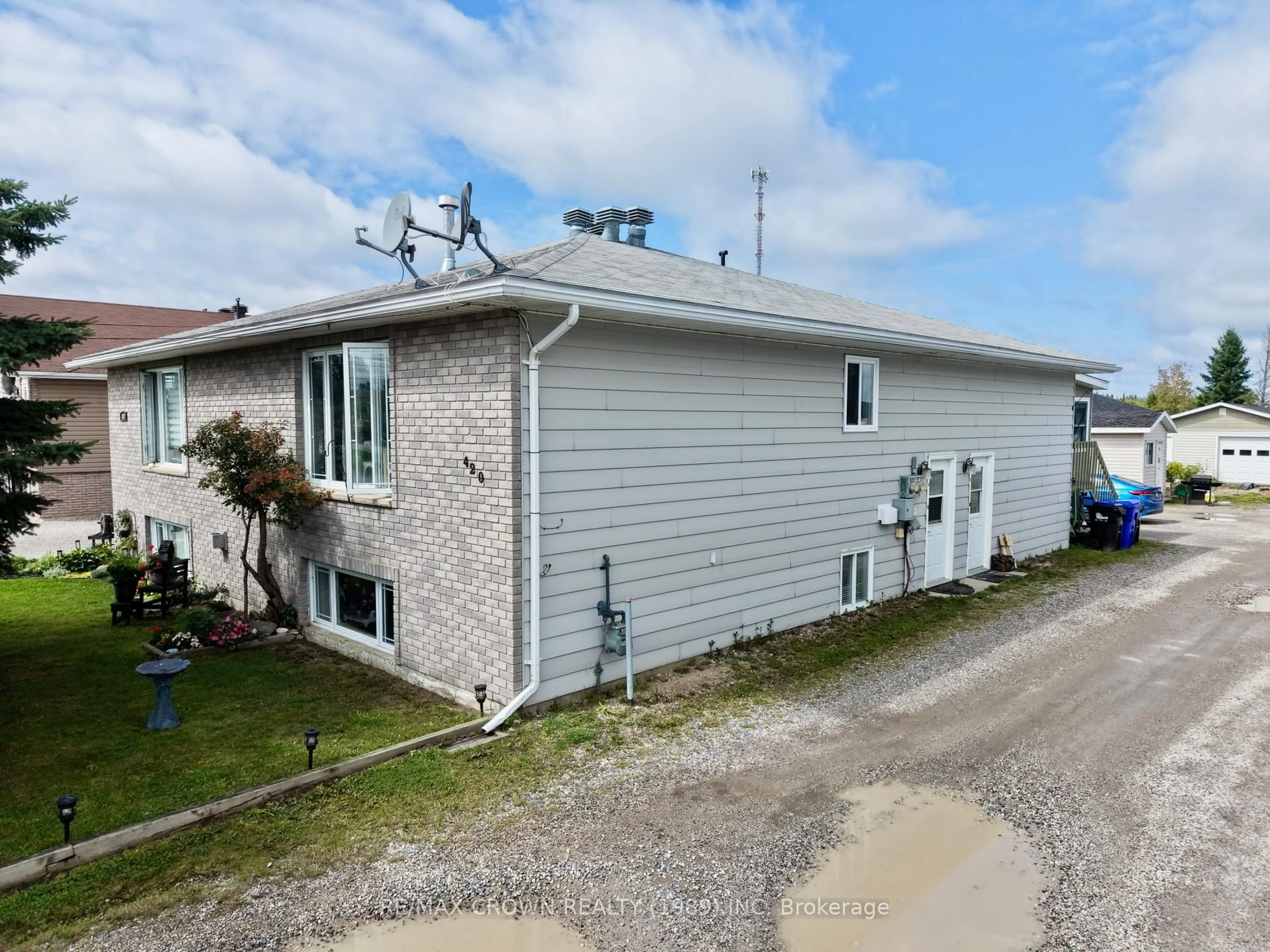 A pic from outside/outdoor area/front of a property/back of a property/a pic from drone, unknown for 420 Brisson Blvd, Hearst Ontario P0L 1N0