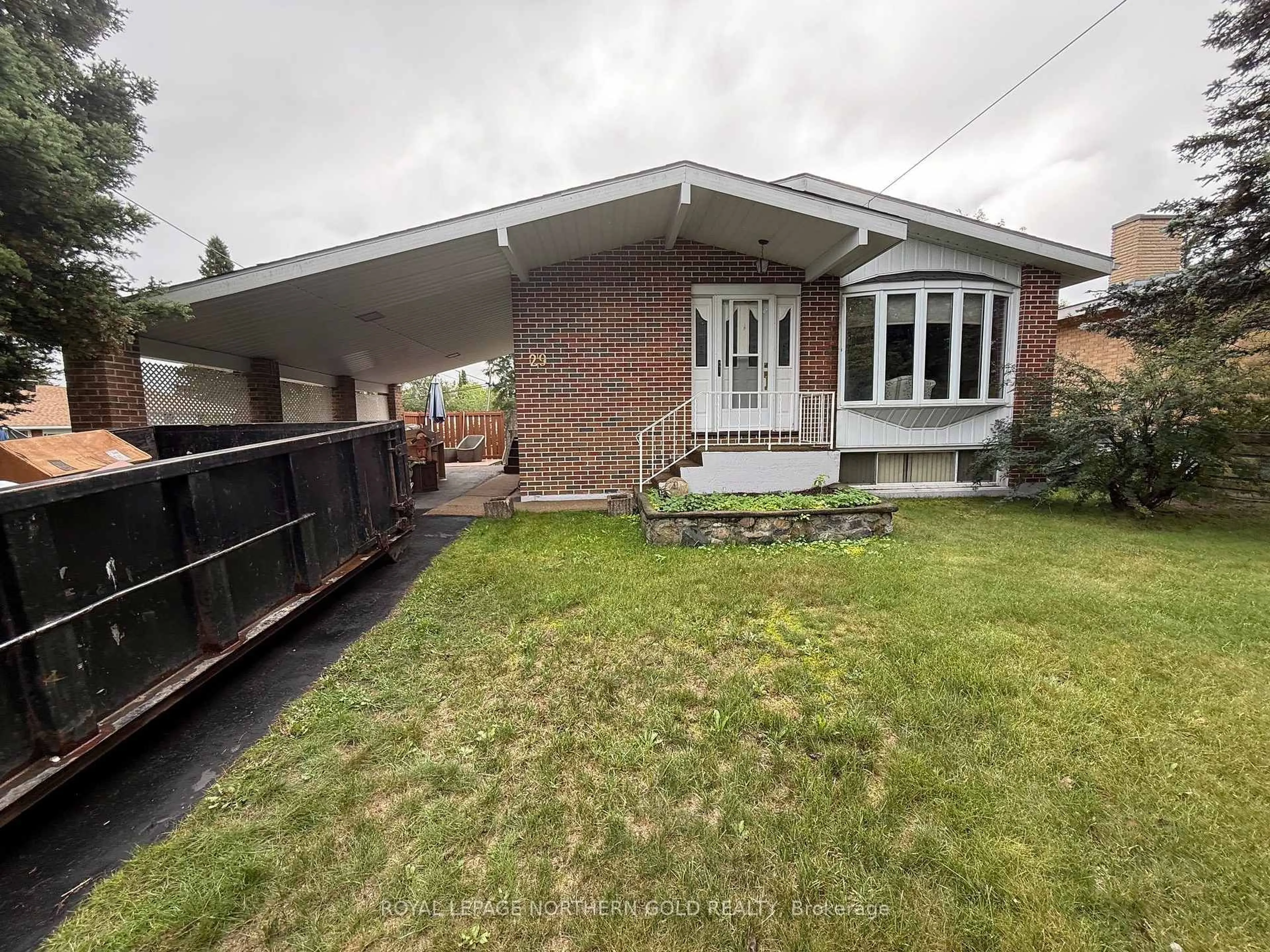A pic from outside/outdoor area/front of a property/back of a property/a pic from drone, street for 29 Macpherson Ave, Kirkland Lake Ontario P2N 1B7