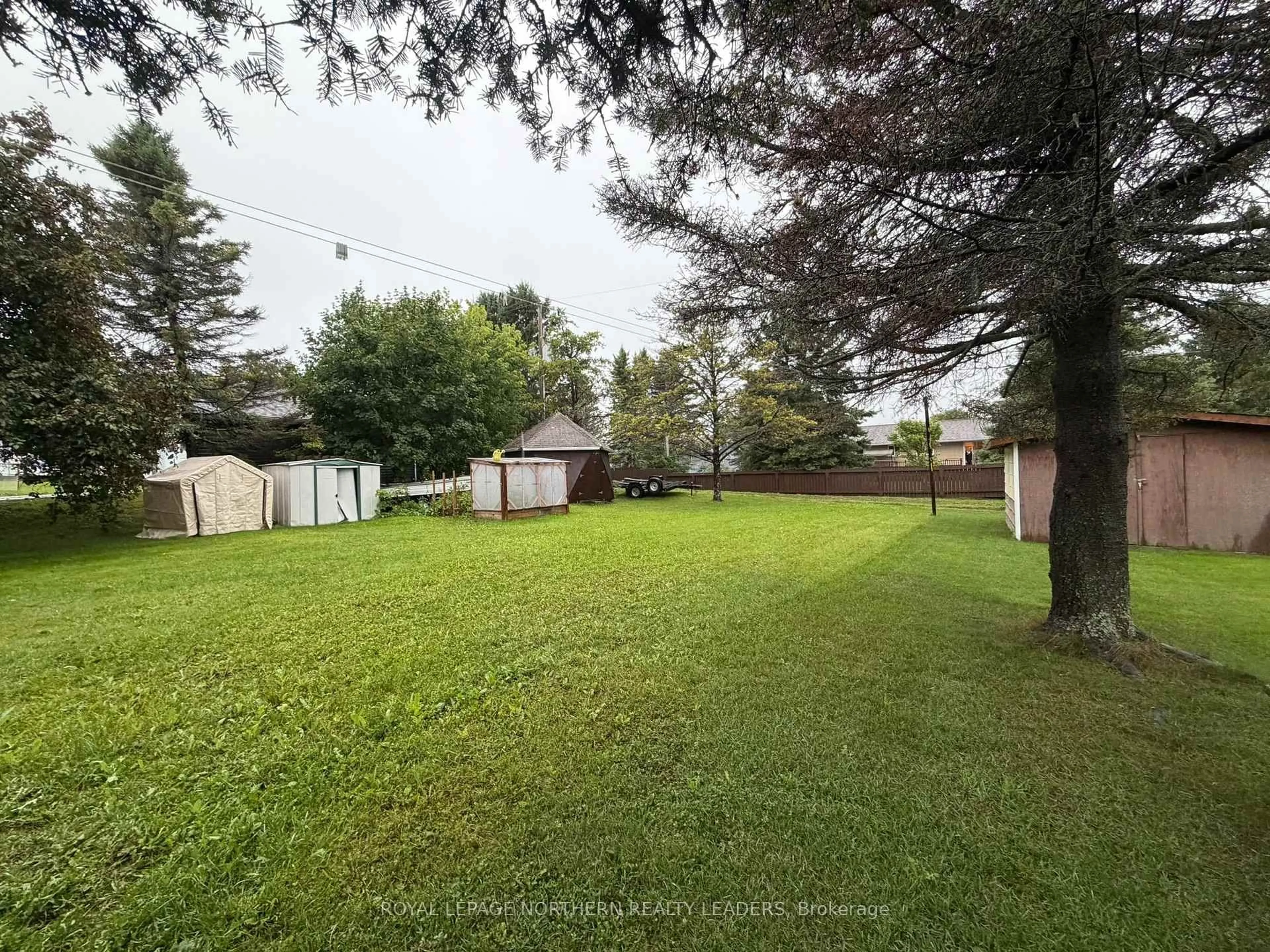 A pic from outside/outdoor area/front of a property/back of a property/a pic from drone, forest/trees view for 291 Fifteenth Ave, Cochrane Ontario P0L 1C0