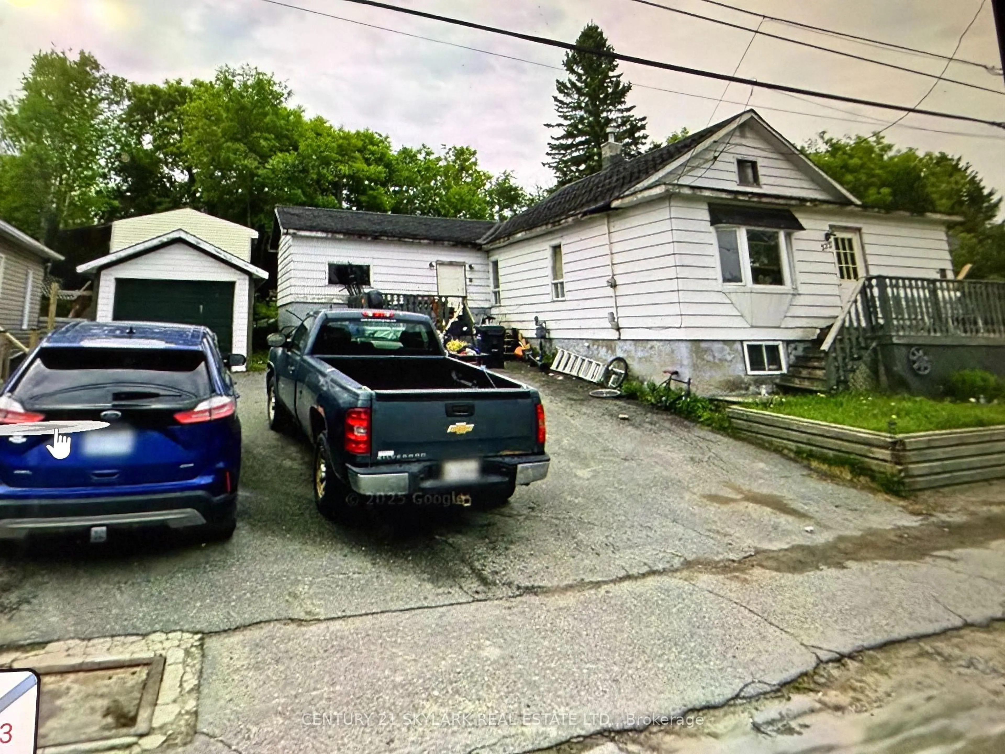 A pic from outside/outdoor area/front of a property/back of a property/a pic from drone, street for 573 Government Rd, Kirkland Lake Ontario P0K 1A0