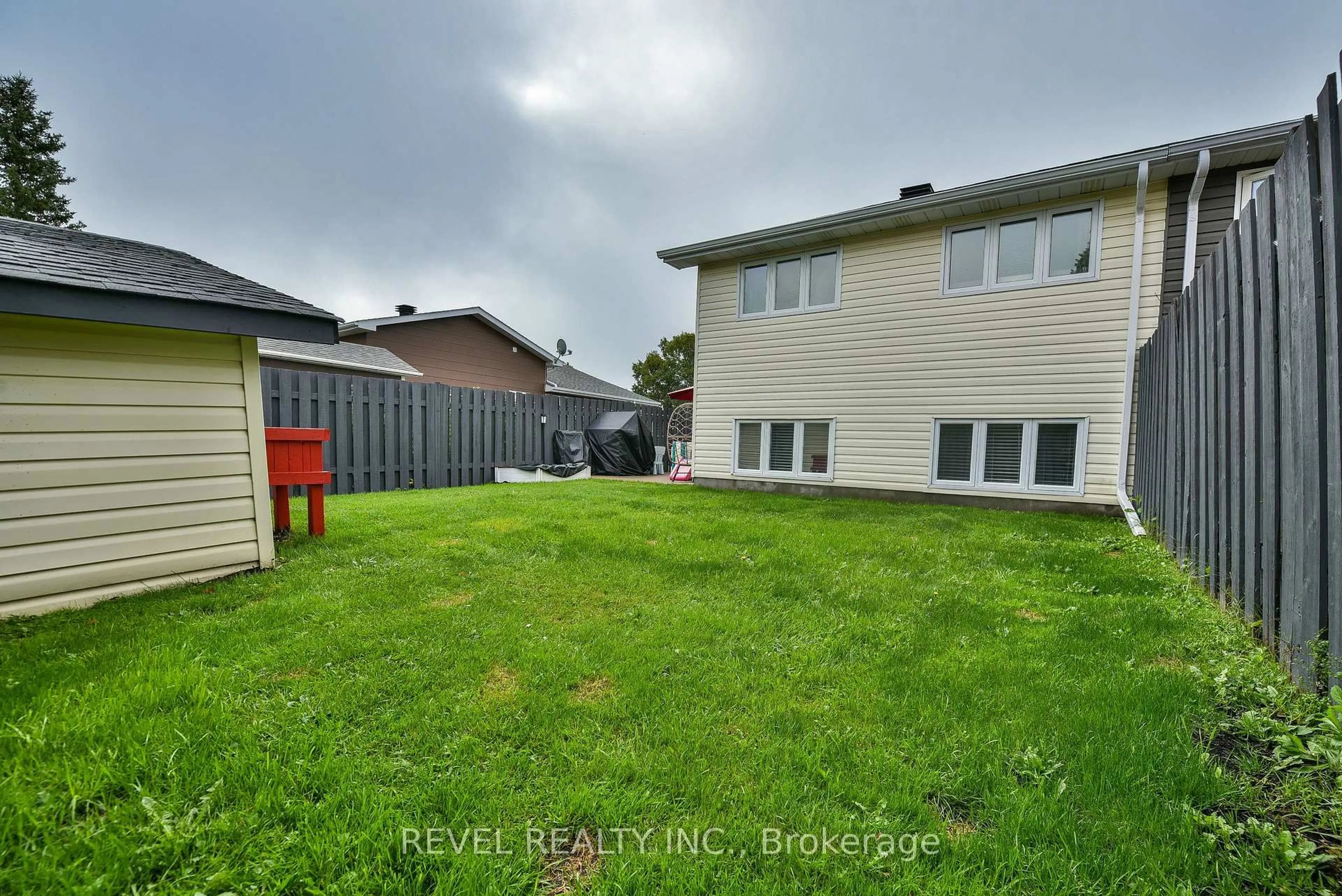 A pic from outside/outdoor area/front of a property/back of a property/a pic from drone, water/lake/river/ocean view for 1288 Chenier Ave, Timmins Ontario P4R 1A7