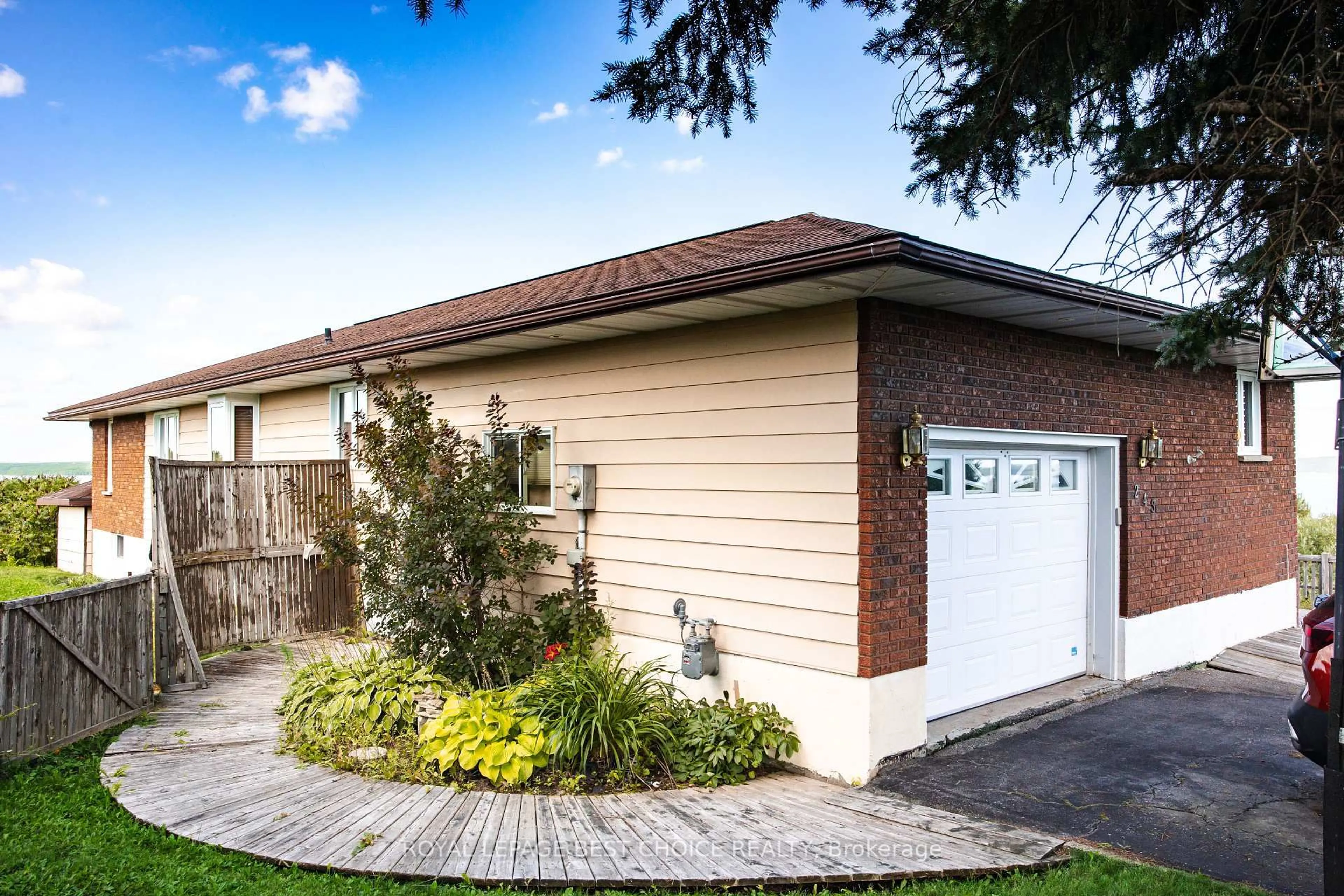 Home with brick exterior material, street for 243 Lawlor St, Temiskaming Shores Ontario P0J 1K0