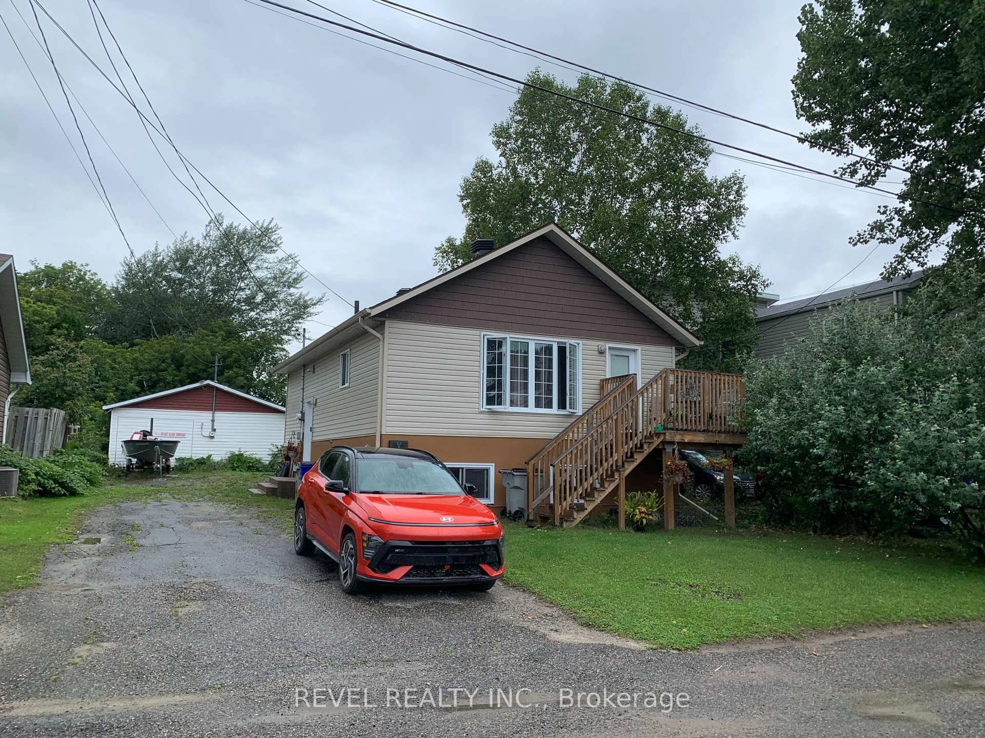 A pic from outside/outdoor area/front of a property/back of a property/a pic from drone, street for 155 Cameron St, Timmins Ontario P4N 5B9