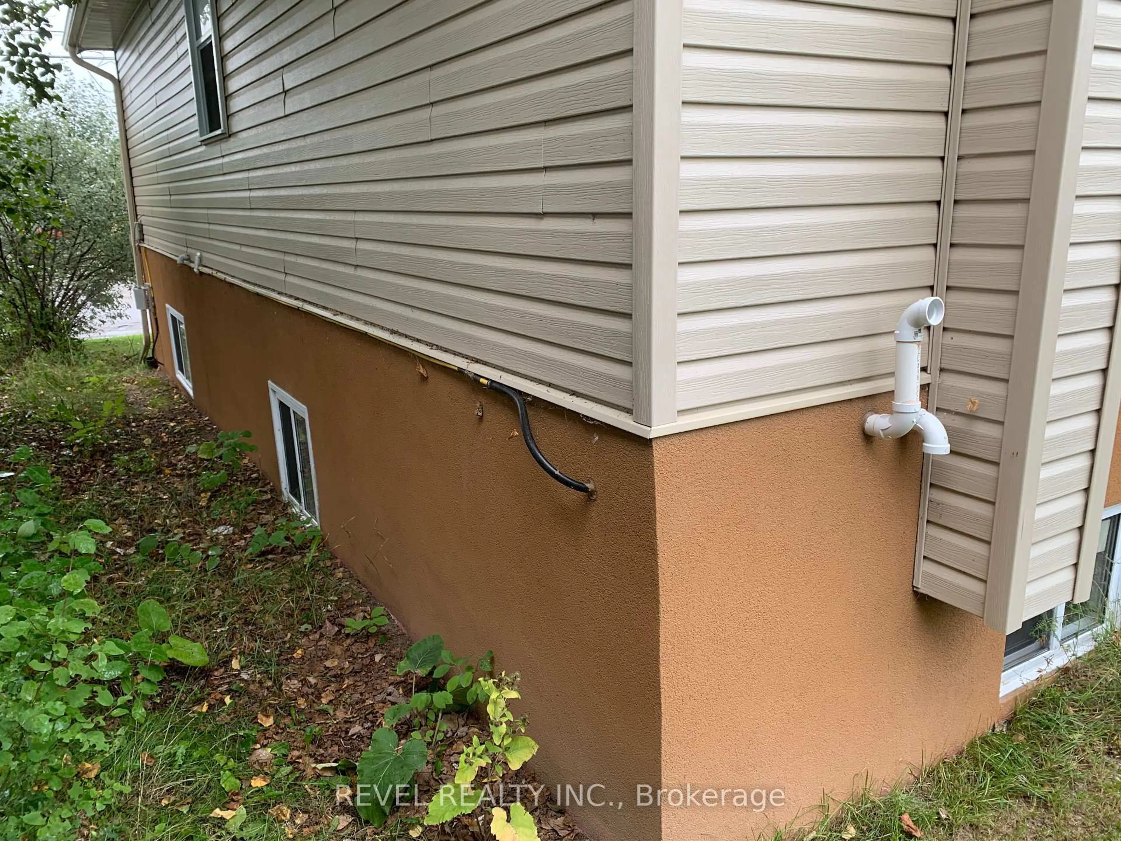Home with vinyl exterior material, street for 155 Cameron St, Timmins Ontario P4N 5B9