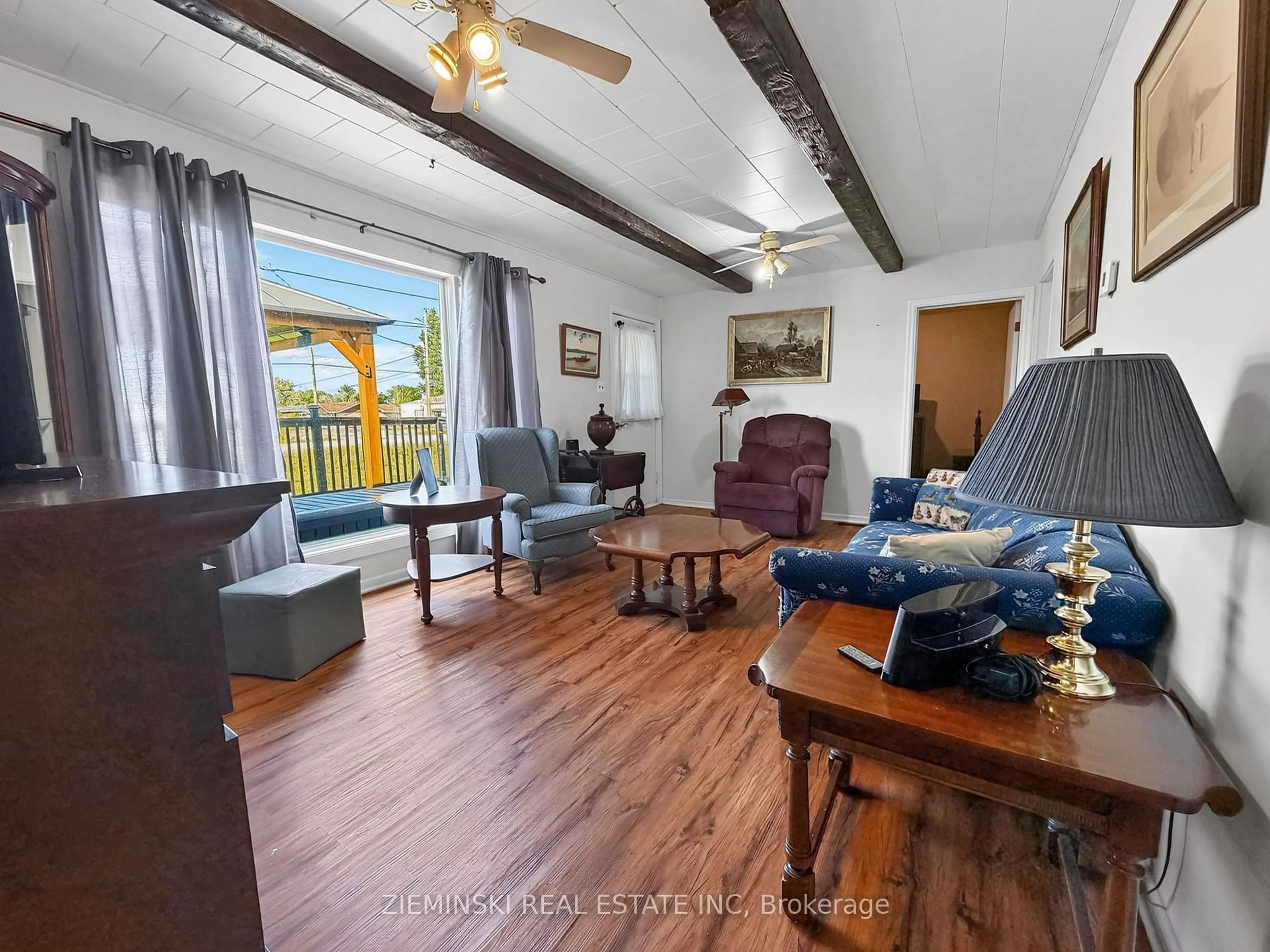 Living room with furniture, wood/laminate floor for 45 Highway 11 Highway, Smooth Rock Falls Ontario P0L 2B0