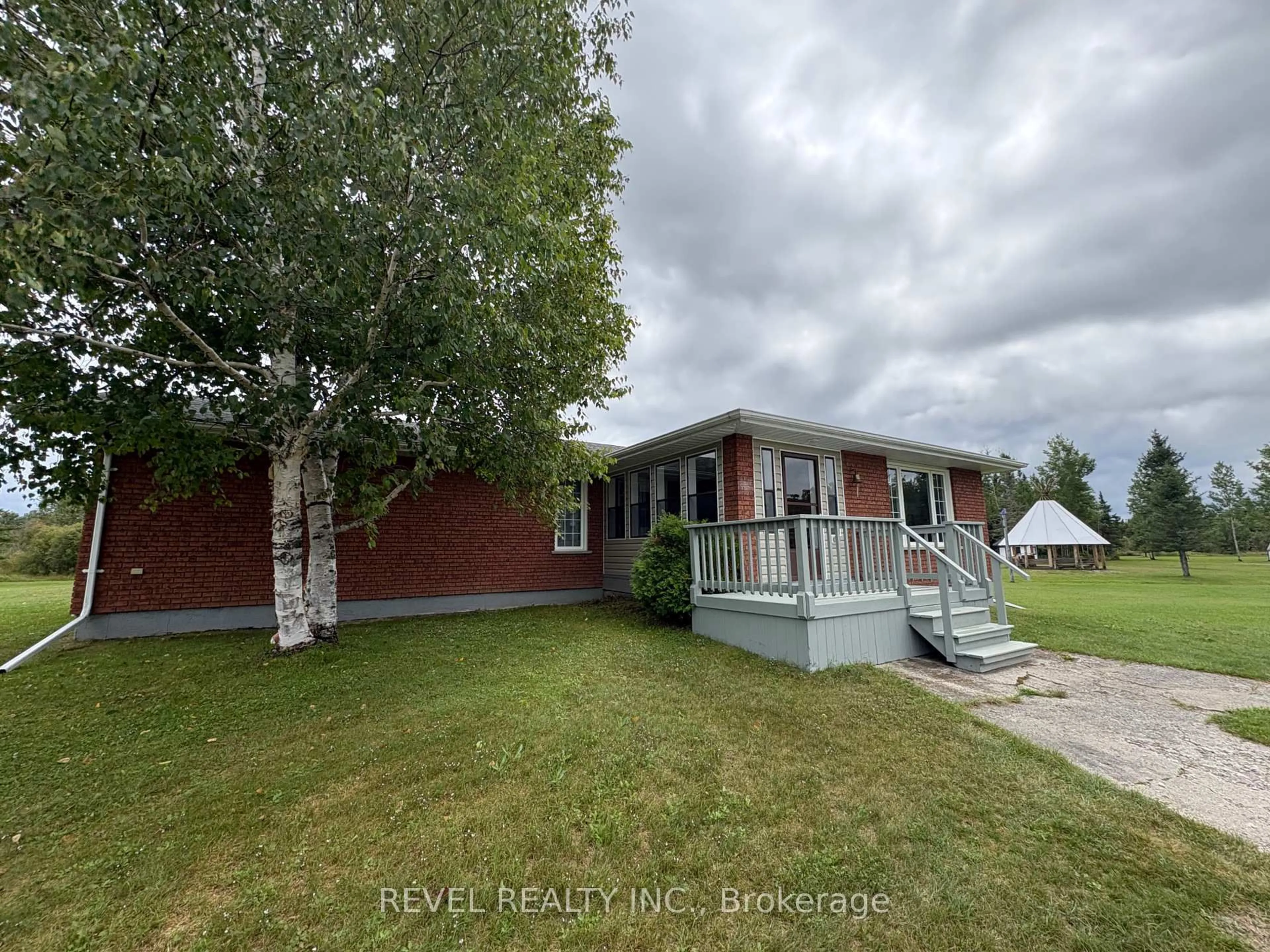 A pic from outside/outdoor area/front of a property/back of a property/a pic from drone, unknown for 226 Hanna Rd, Cochrane Ontario P0L 1C0