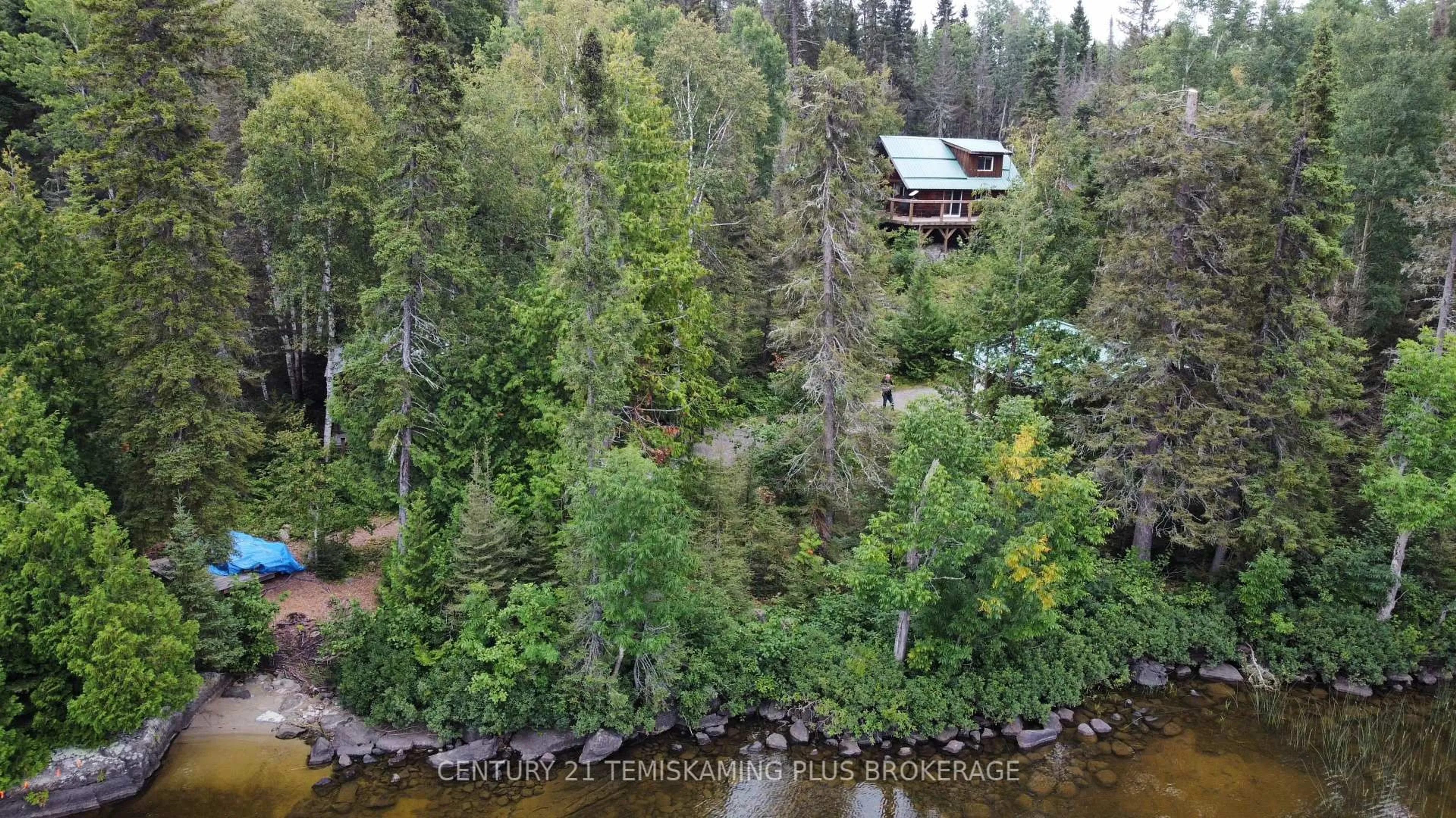 A pic from outside/outdoor area/front of a property/back of a property/a pic from drone, water/lake/river/ocean view for 320 Shallow Bay Rd, Kirkland Lake Ontario P0K 1T0