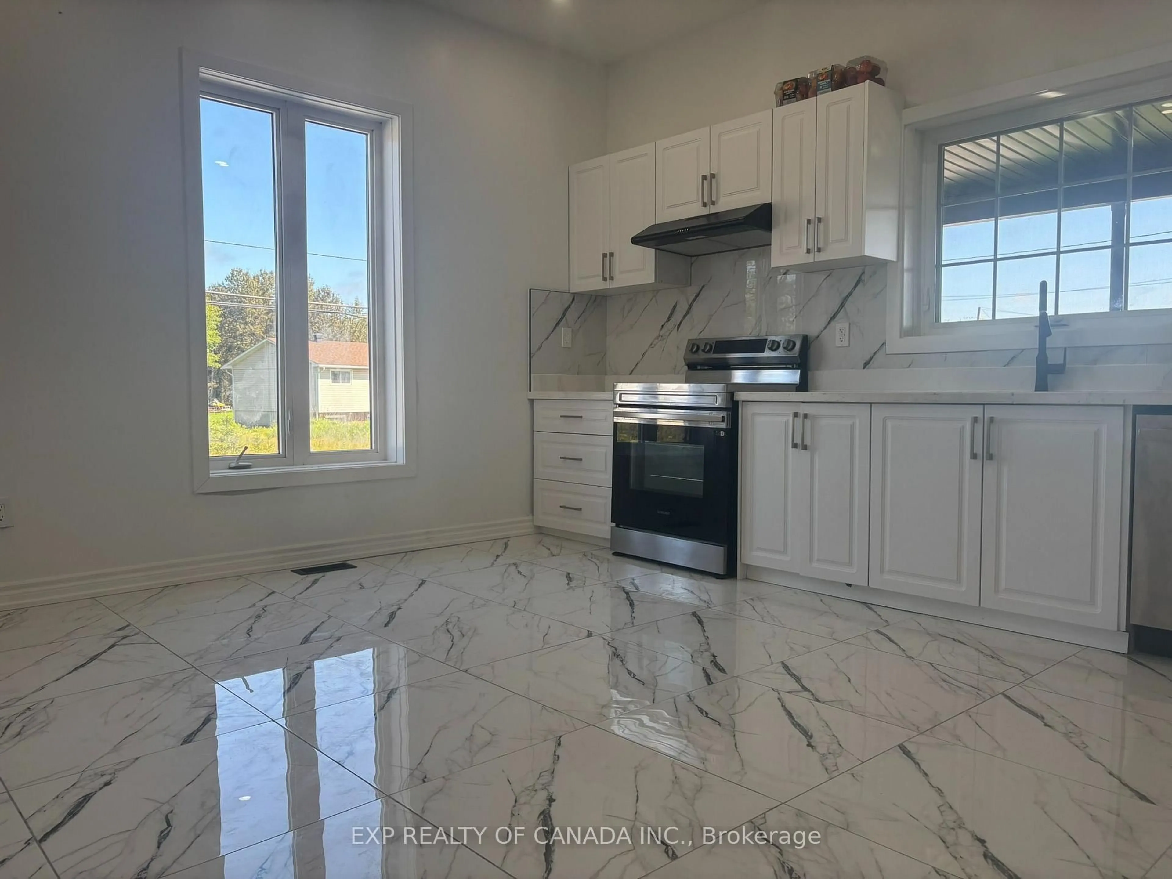 Open concept kitchen, ceramic/tile floor for 100 Conley St, Timmins Ontario P0N 1C0