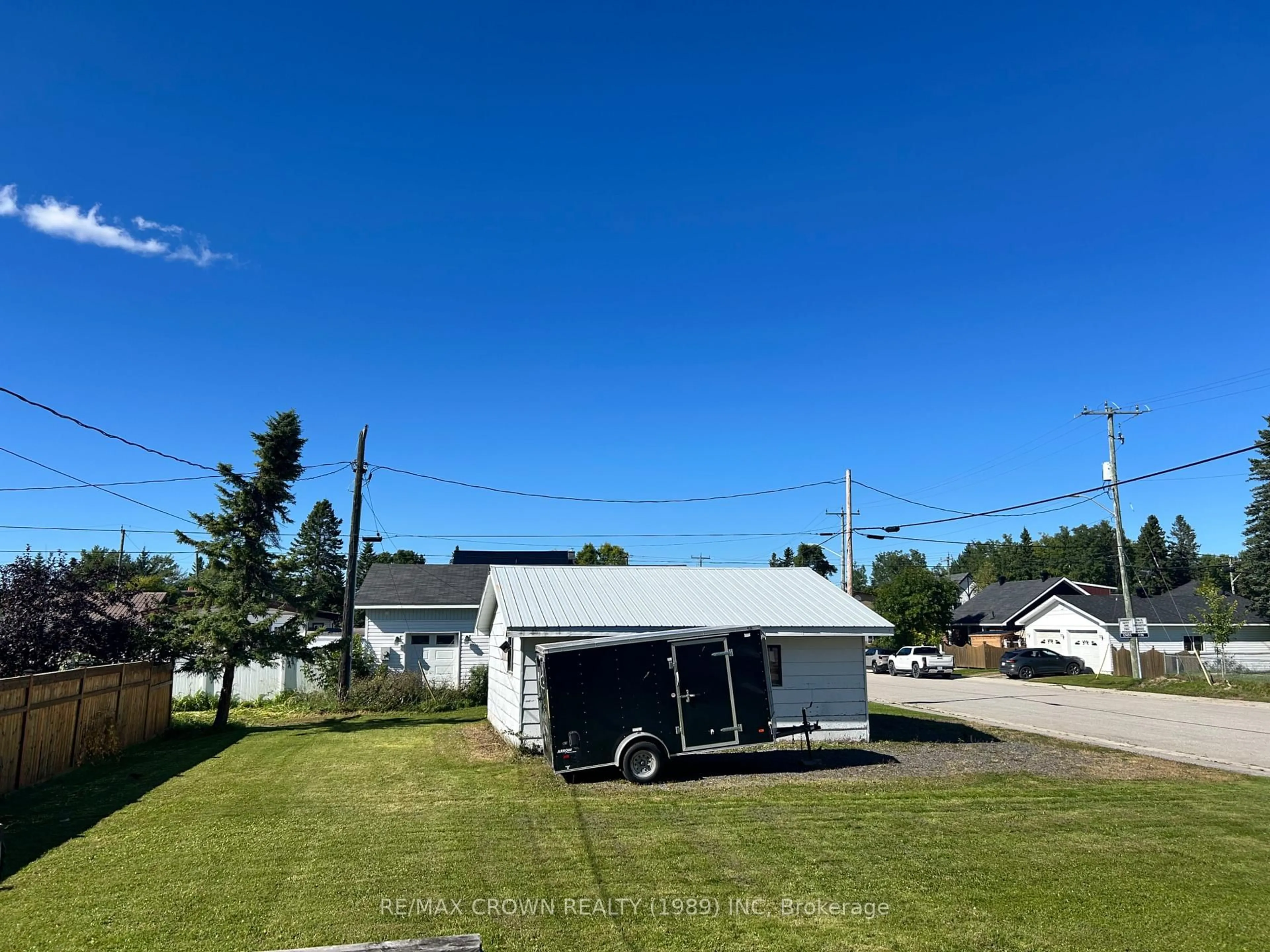 A pic from outside/outdoor area/front of a property/back of a property/a pic from drone, street for 85 Dominion Ave, Kapuskasing Ontario P5N 1P3
