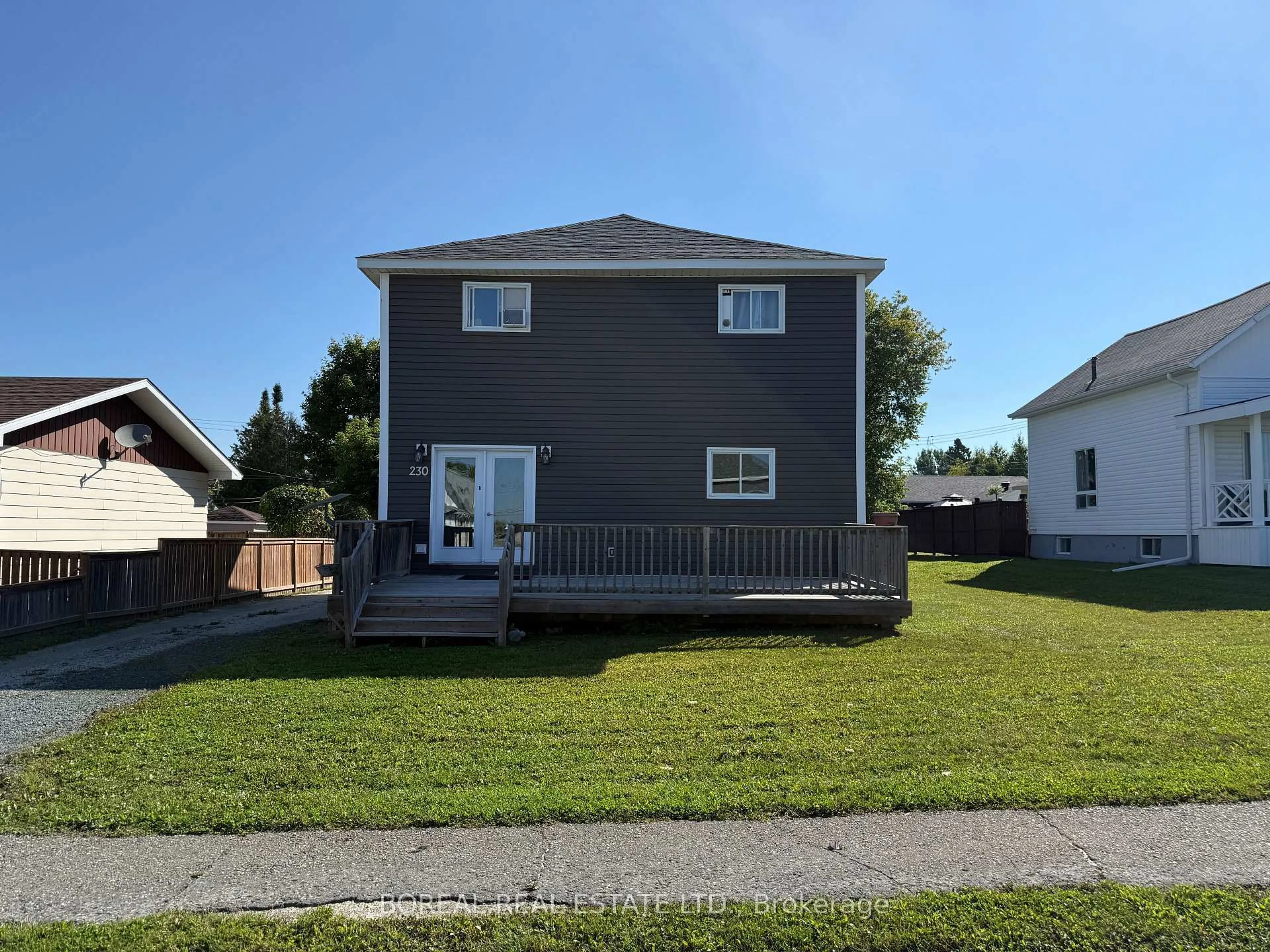 Home with vinyl exterior material, street for 230 Tenth Ave, Cochrane Ontario P0L 1C0