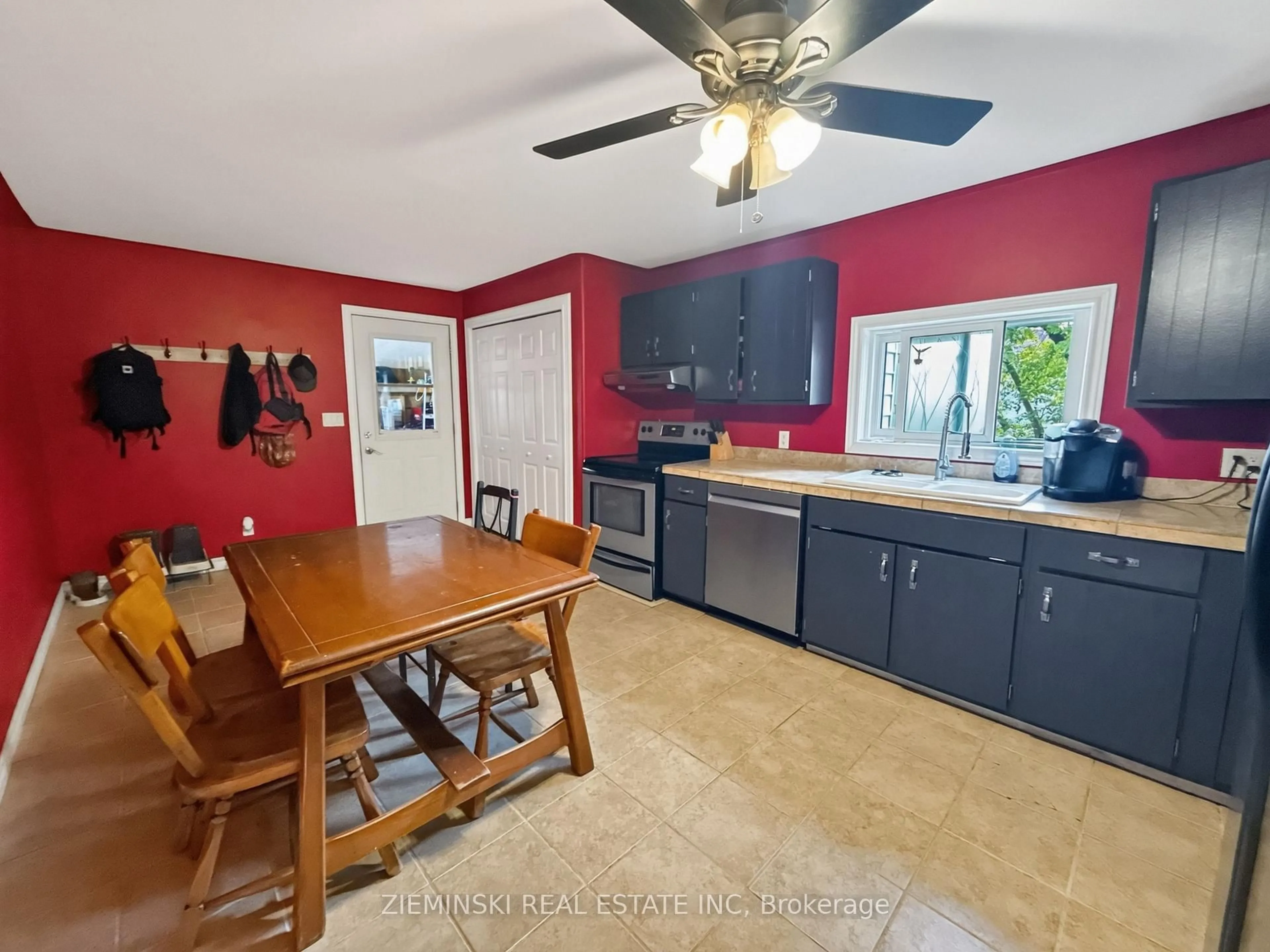 Open concept kitchen, ceramic/tile floor for 73-75 Cedar St, Timmins Ontario P4N 6J1