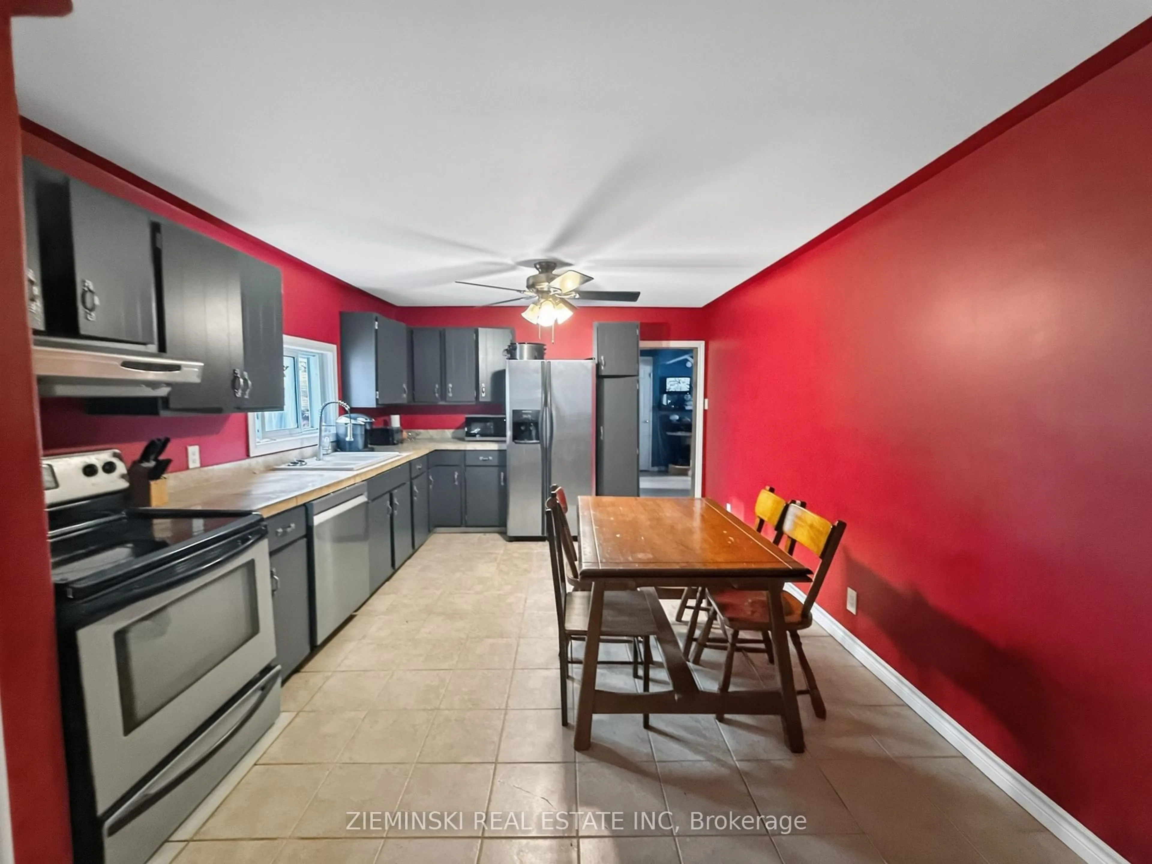 Open concept kitchen, ceramic/tile floor for 73-75 Cedar St, Timmins Ontario P4N 6J1