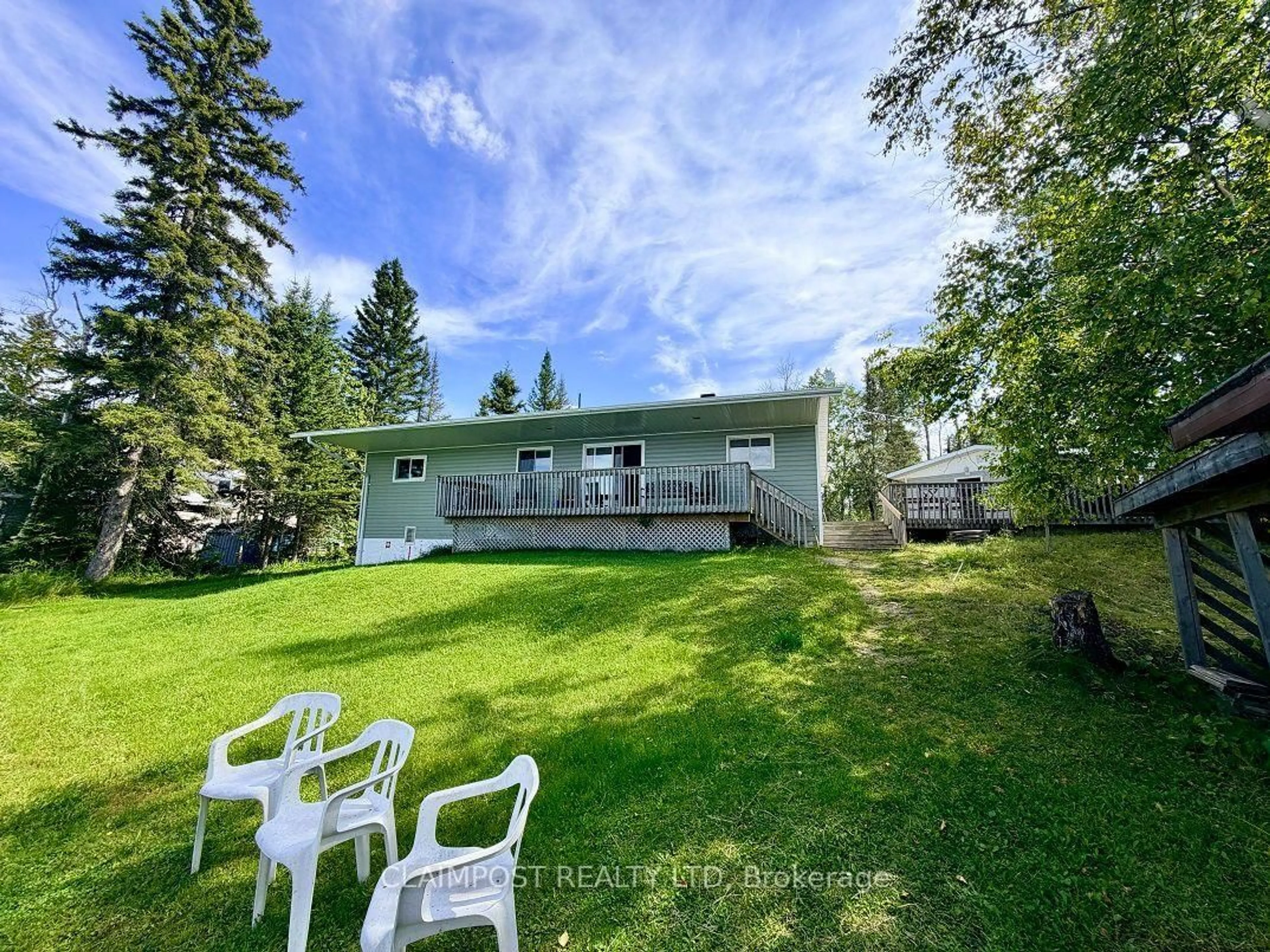 A pic from outside/outdoor area/front of a property/back of a property/a pic from drone, water/lake/river/ocean view for 1102 Aubry Rd, Iroquois Falls Ontario P0K 1G0