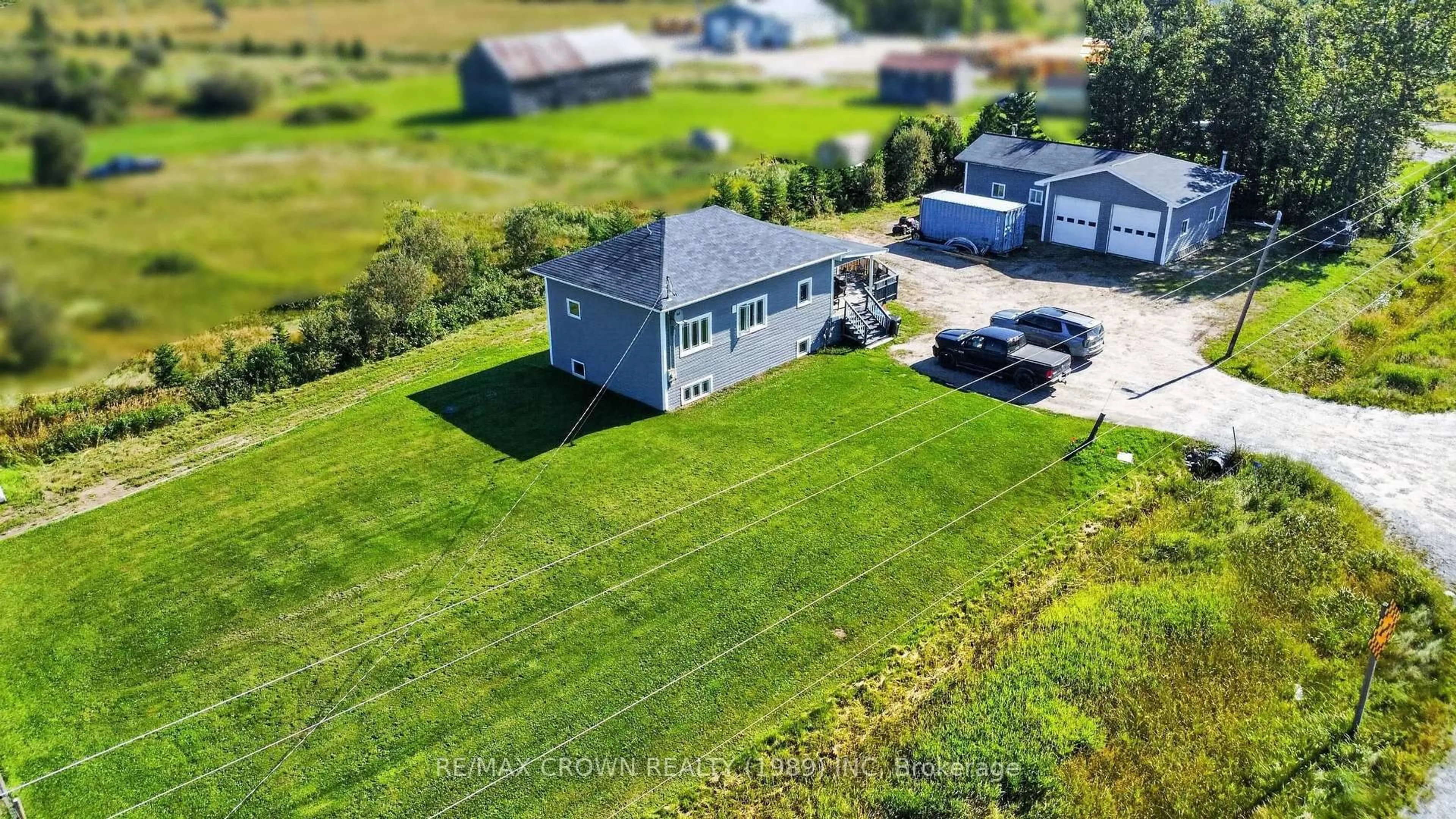 A pic from outside/outdoor area/front of a property/back of a property/a pic from drone, unknown for 84 Highway 11 Highway, Hearst Ontario P0L 1N0