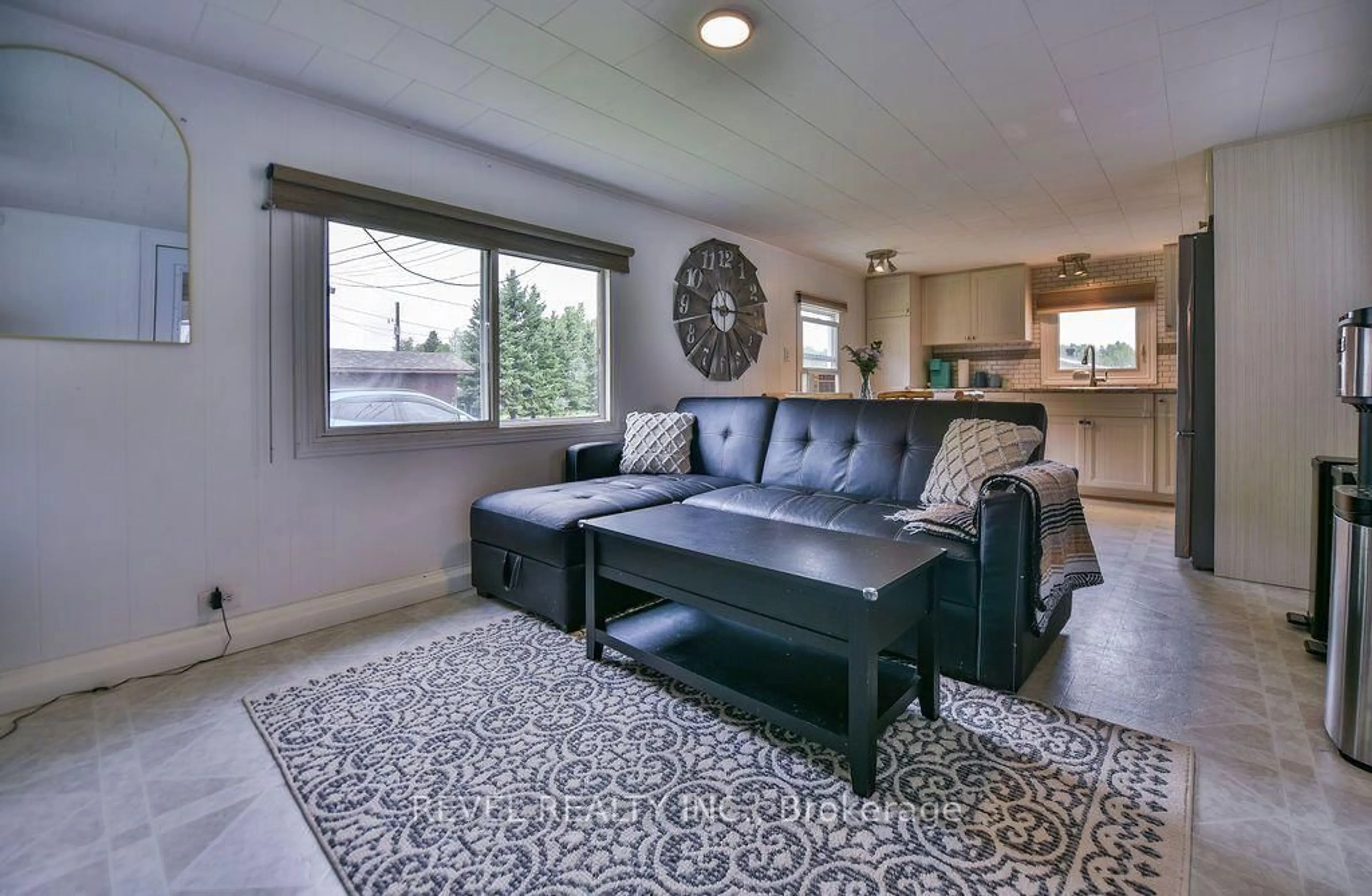 Living room with furniture, unknown for 30 Notre Dame, Timmins Ontario P4R 0C9