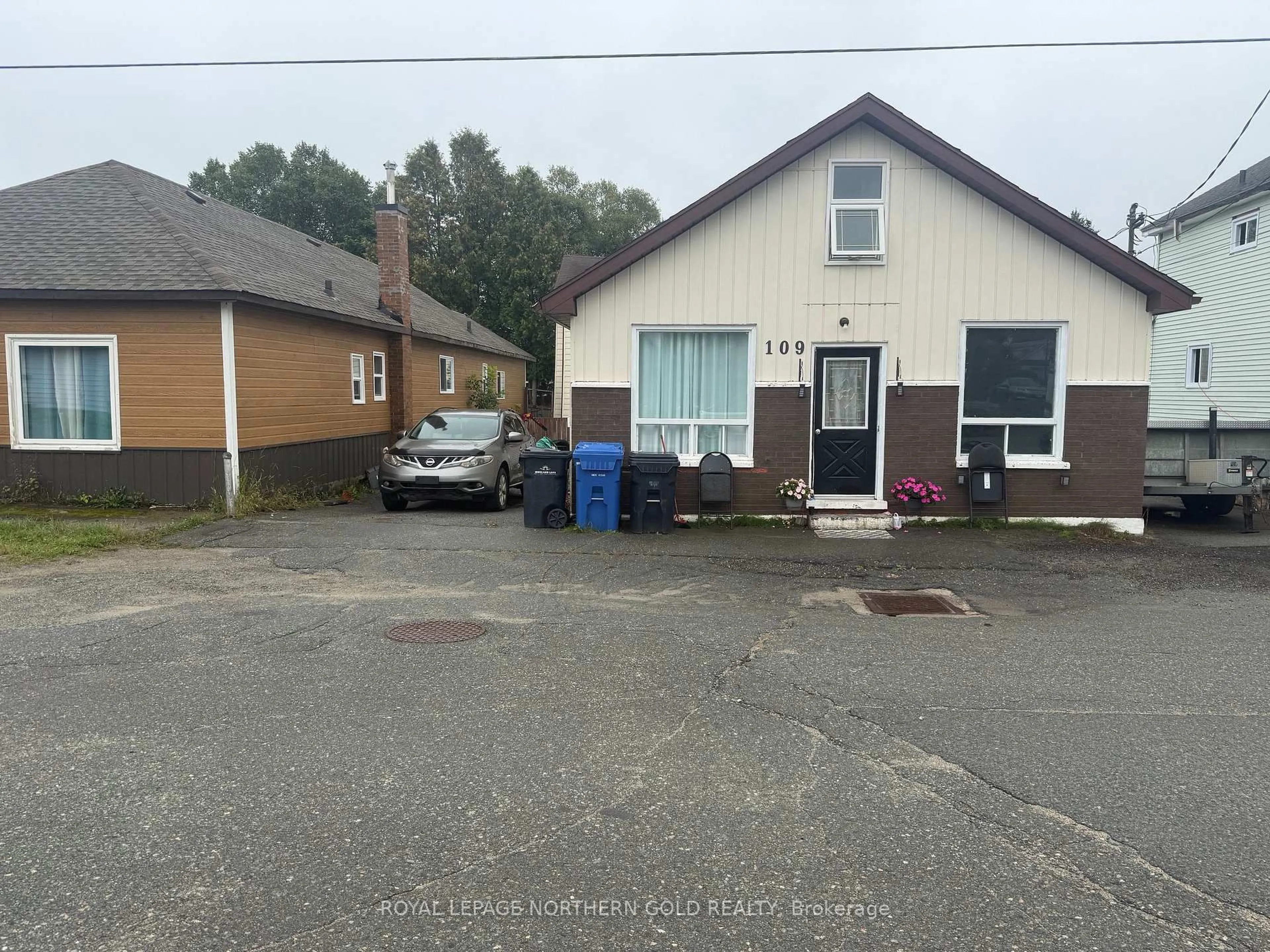 A pic from outside/outdoor area/front of a property/back of a property/a pic from drone, unknown for 109 Poplar Ave, Kirkland Lake Ontario P2N 2N3