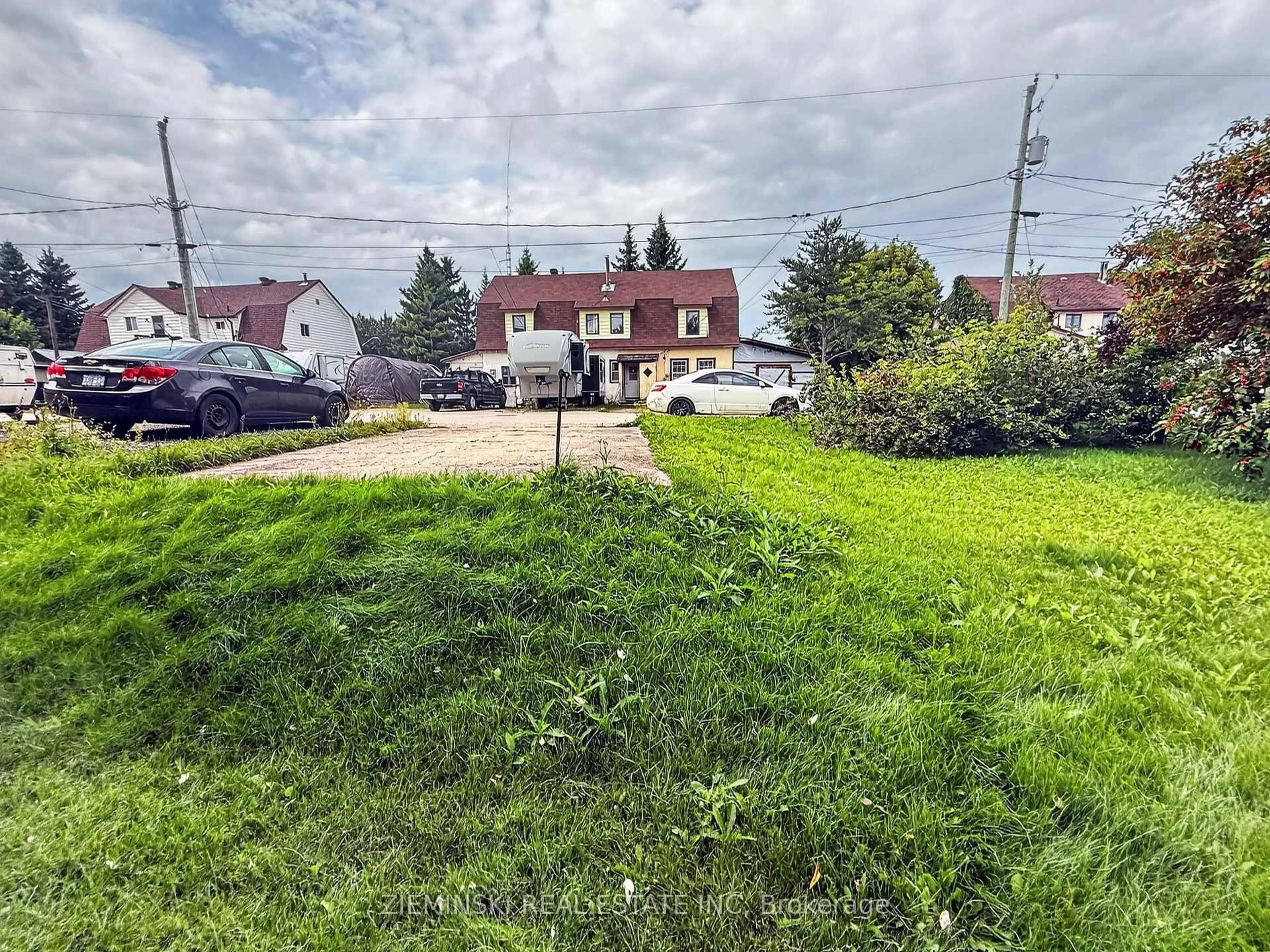 A pic from outside/outdoor area/front of a property/back of a property/a pic from drone, street for 106 Argyle Ave, Iroquois Falls Ontario P0K 1E0