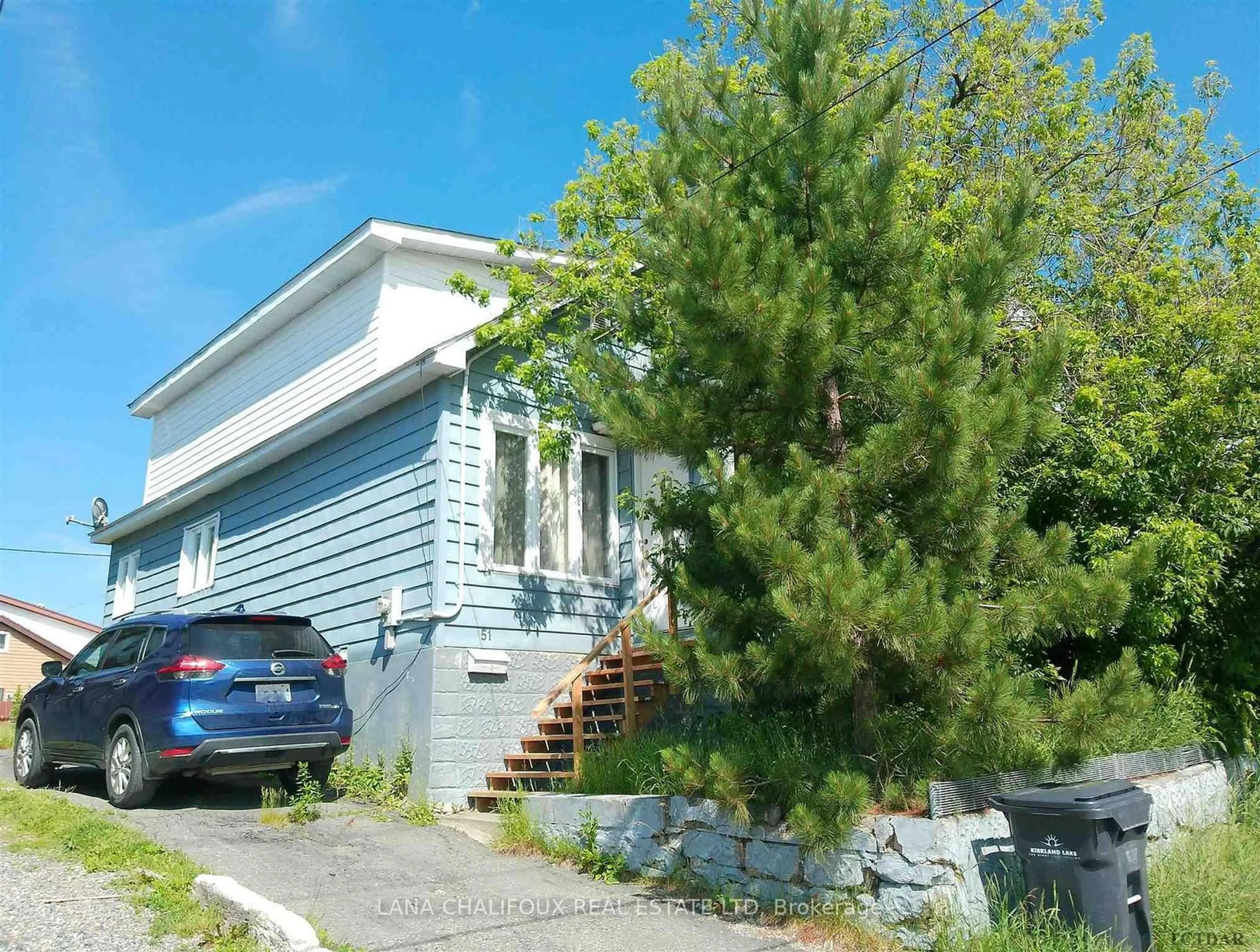 Frontside or backside of a home, the street view for 51 Woods St, Kirkland Lake Ontario P2N 3B7