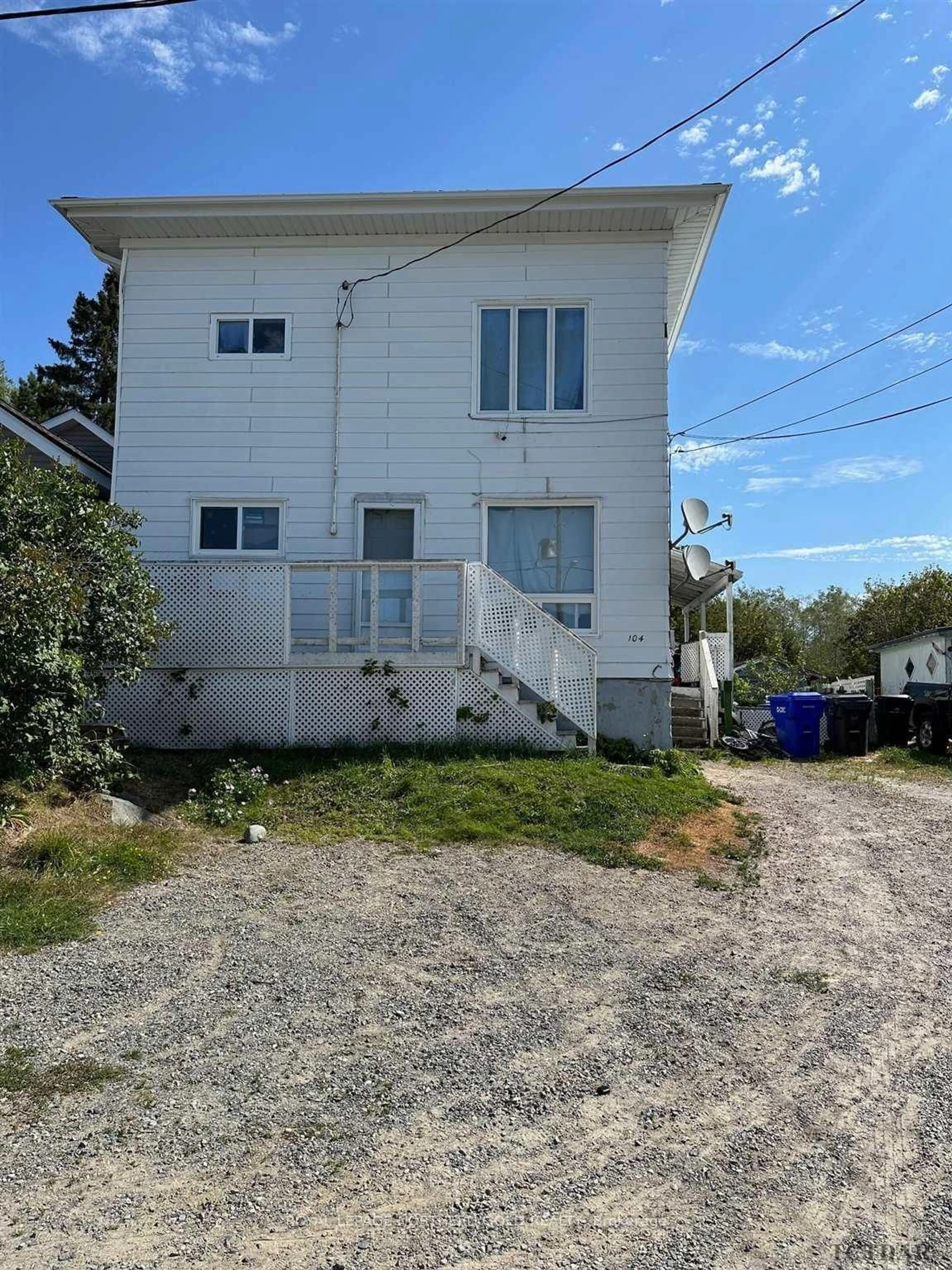 Frontside or backside of a home, the front or back of building for 104 Carter Ave, Kirkland Lake Ontario P2N 1Z7