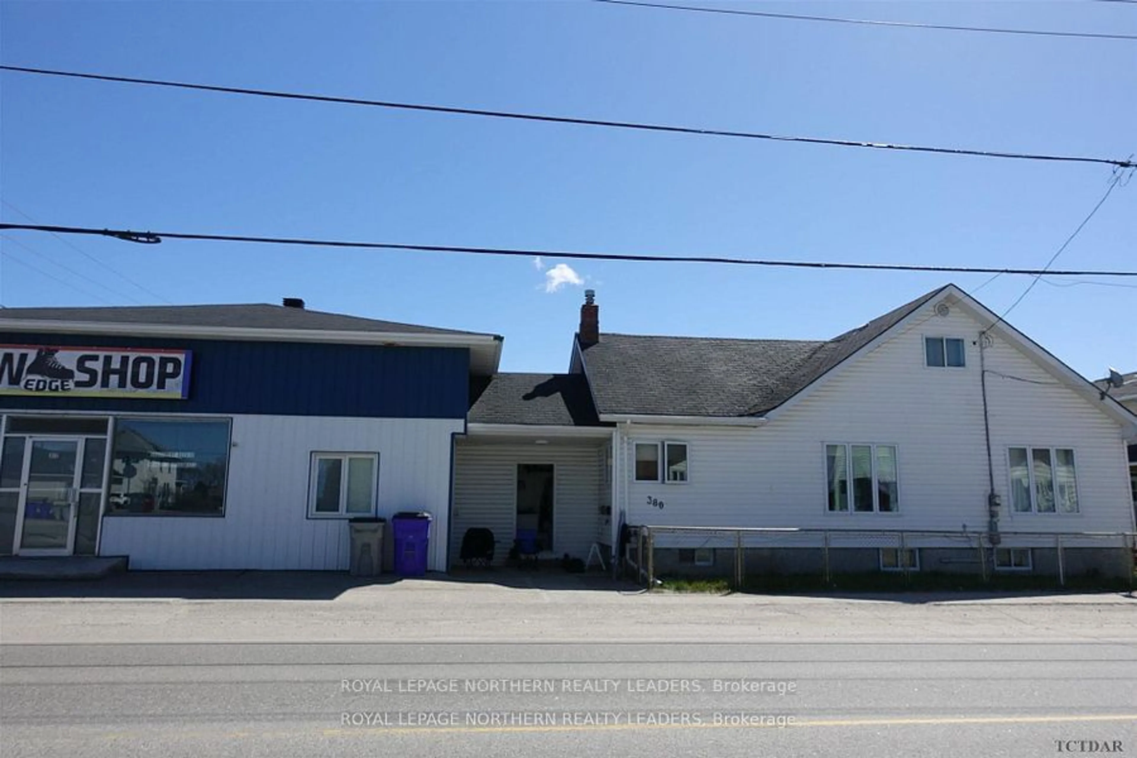 Frontside or backside of a home, the front or back of building for 372-380 Pine St, Timmins Ontario P4N 2L3