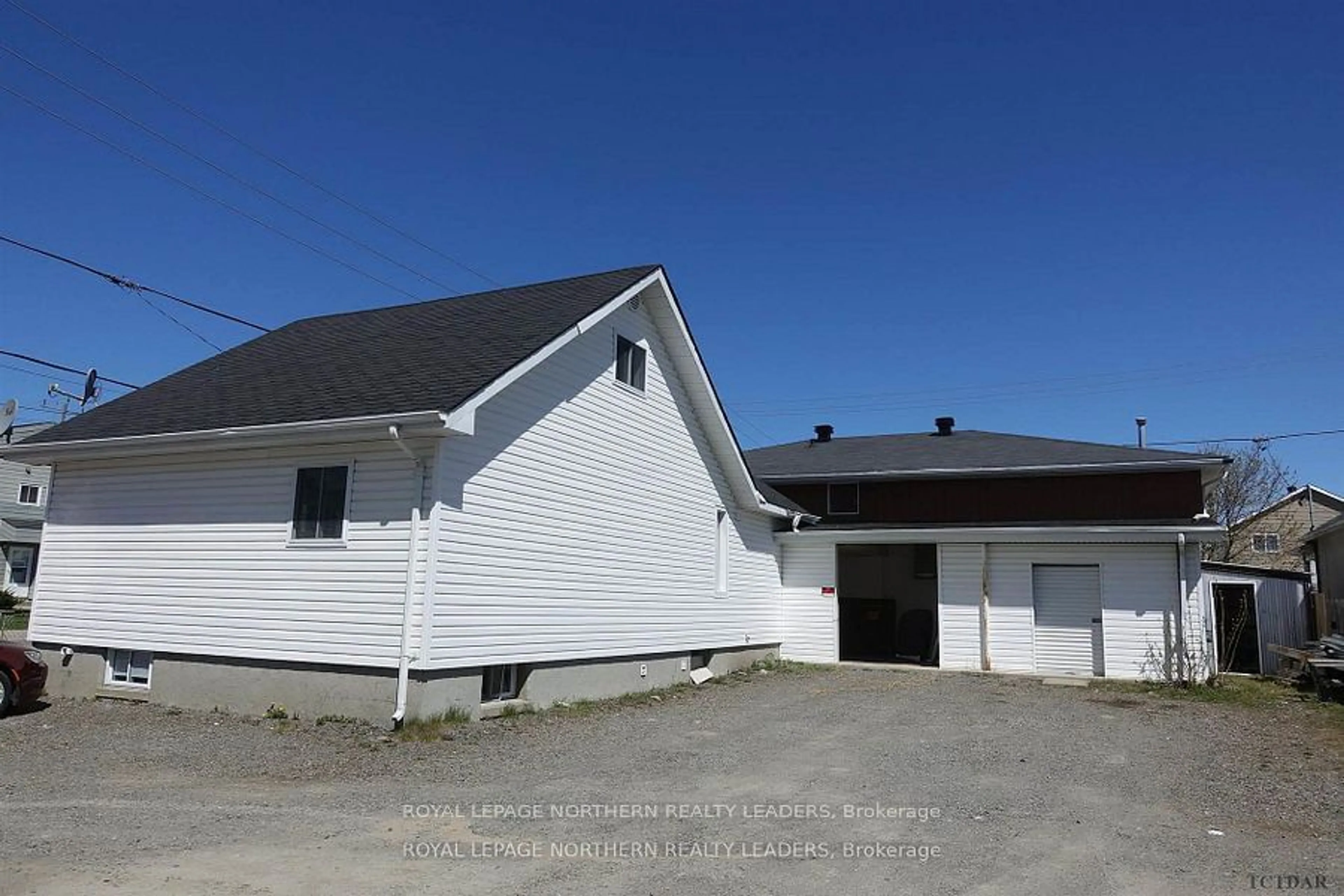 Frontside or backside of a home, the front or back of building for 372-380 Pine St, Timmins Ontario P4N 2L3