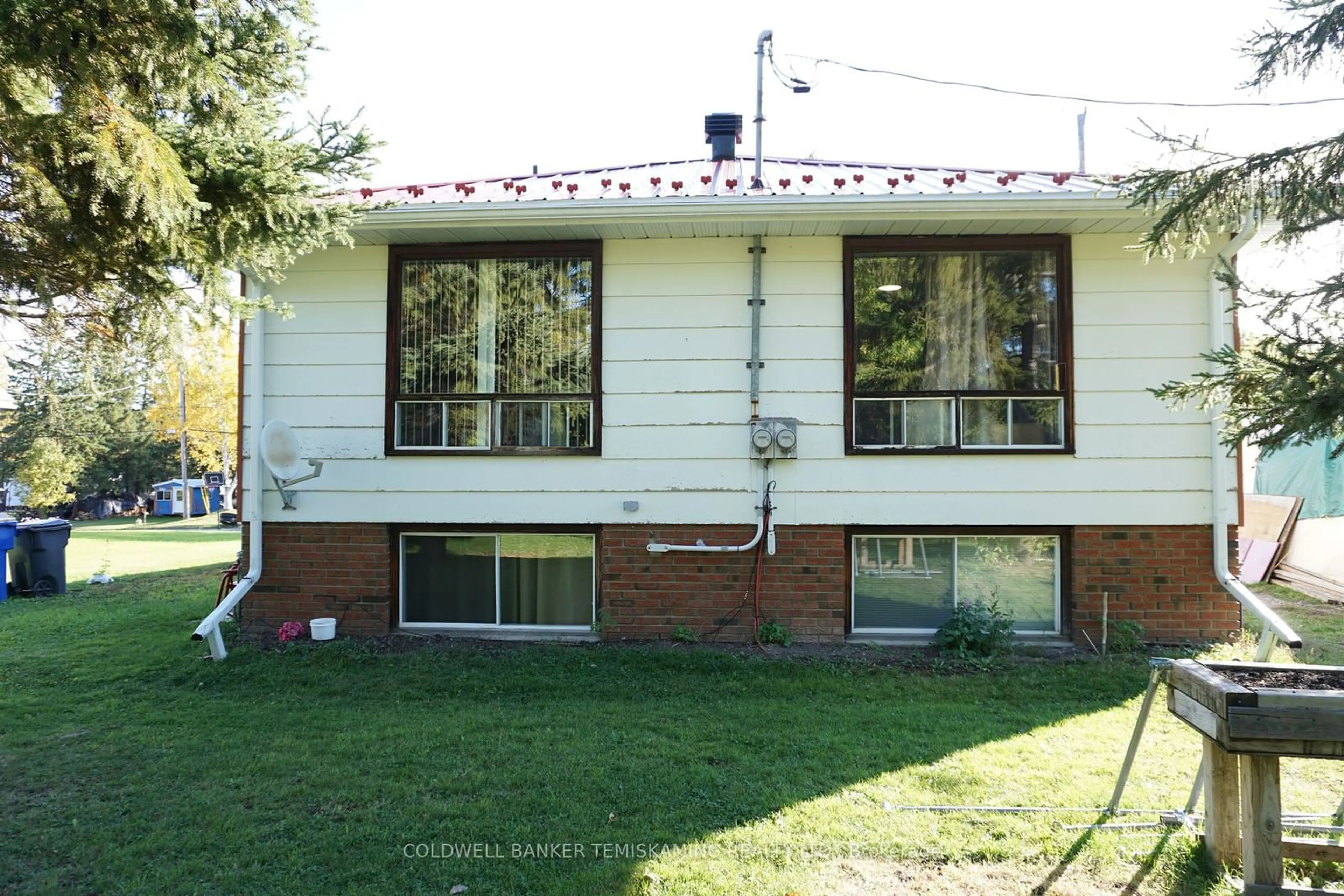 Frontside or backside of a home, the front or back of building for 141 & 143 Station St, Temiskaming Shores Ontario P0J 1R0