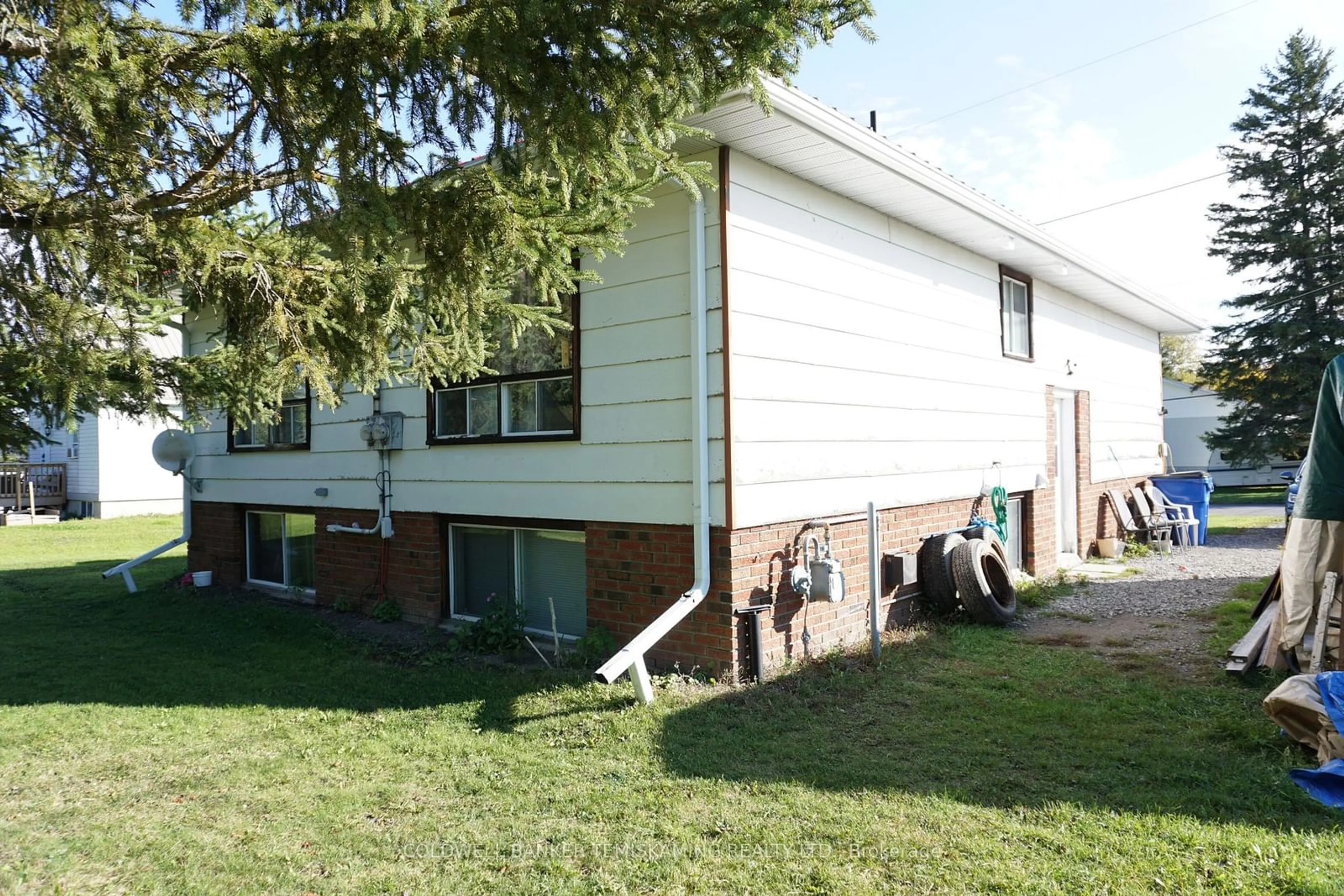 Frontside or backside of a home, the front or back of building for 141 & 143 Station St, Temiskaming Shores Ontario P0J 1R0