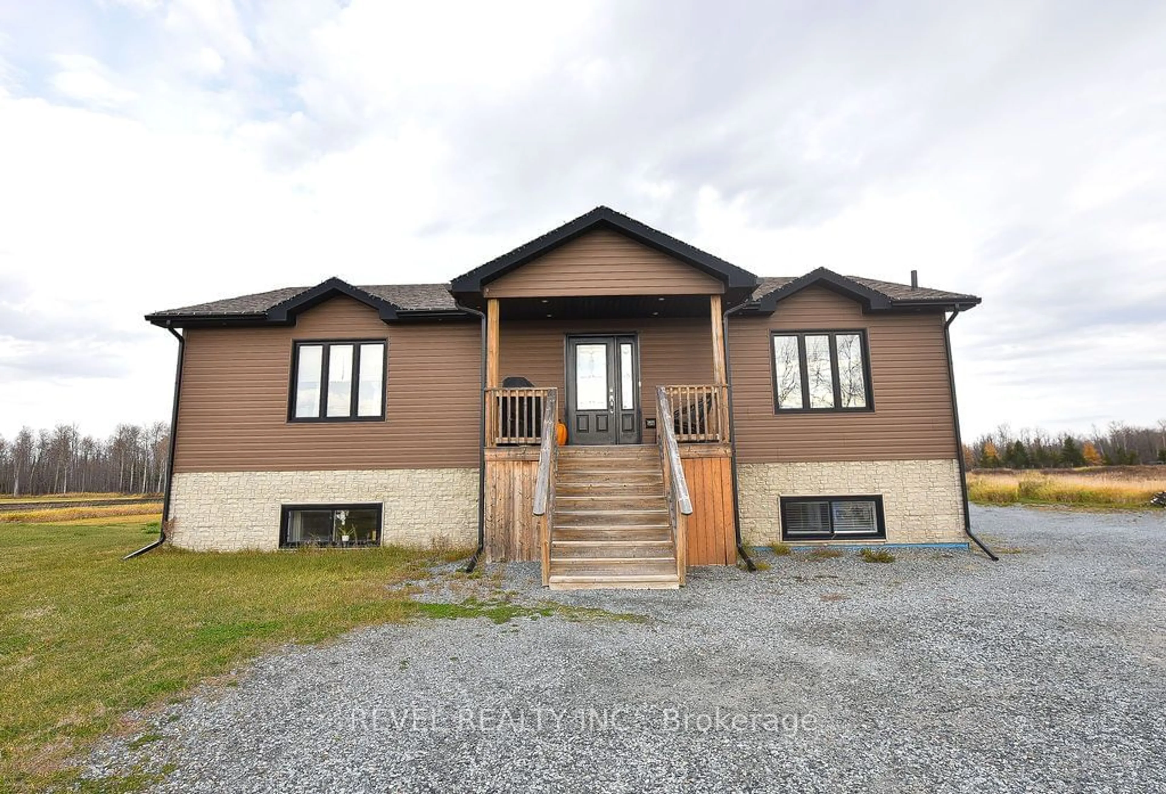 Frontside or backside of a home, the front or back of building for 1424 Laforest Rd, Timmins Ontario P4P 7C7