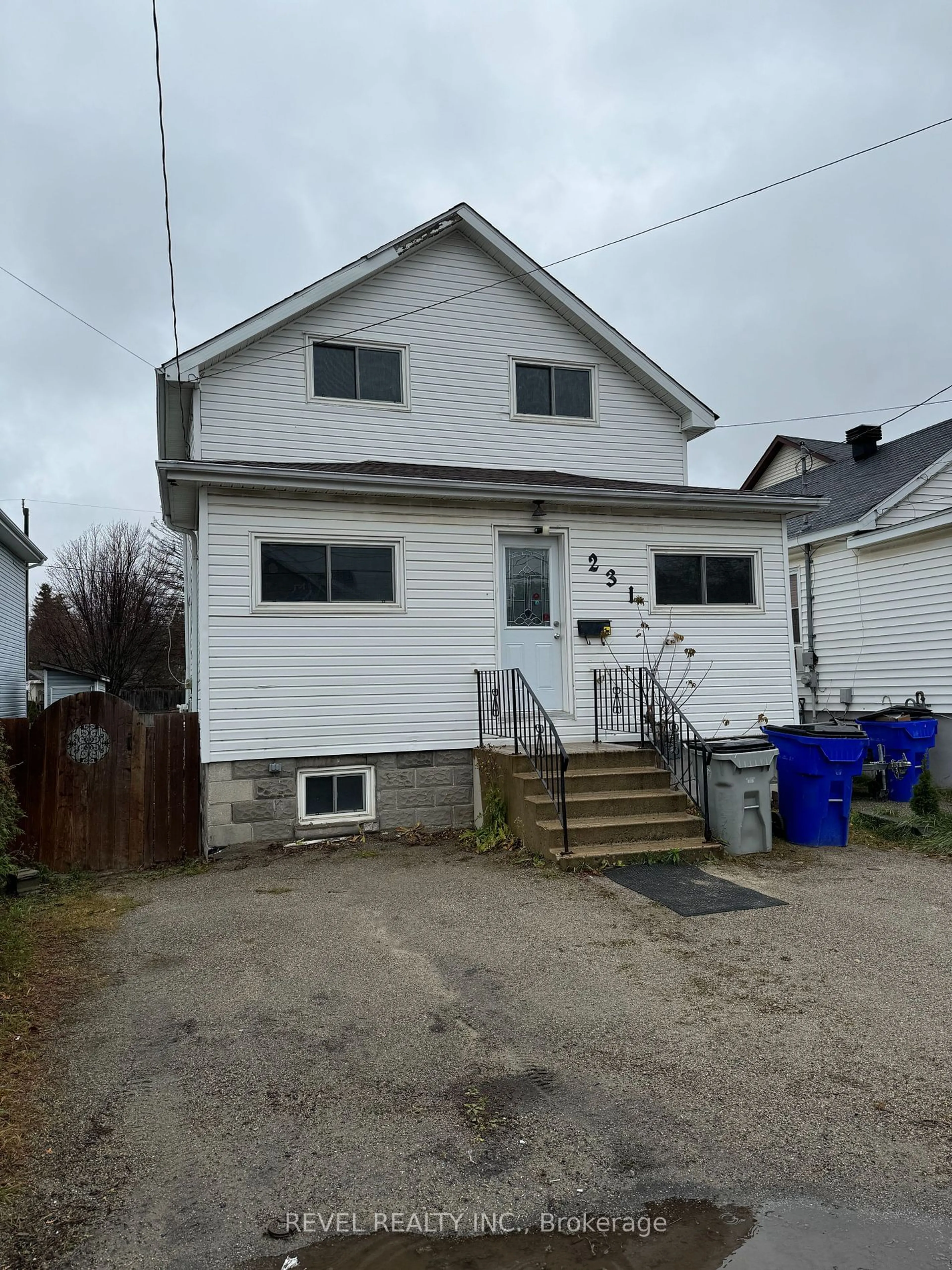 Frontside or backside of a home, the front or back of building for 231 Elm St, Timmins Ontario P4N 6A8