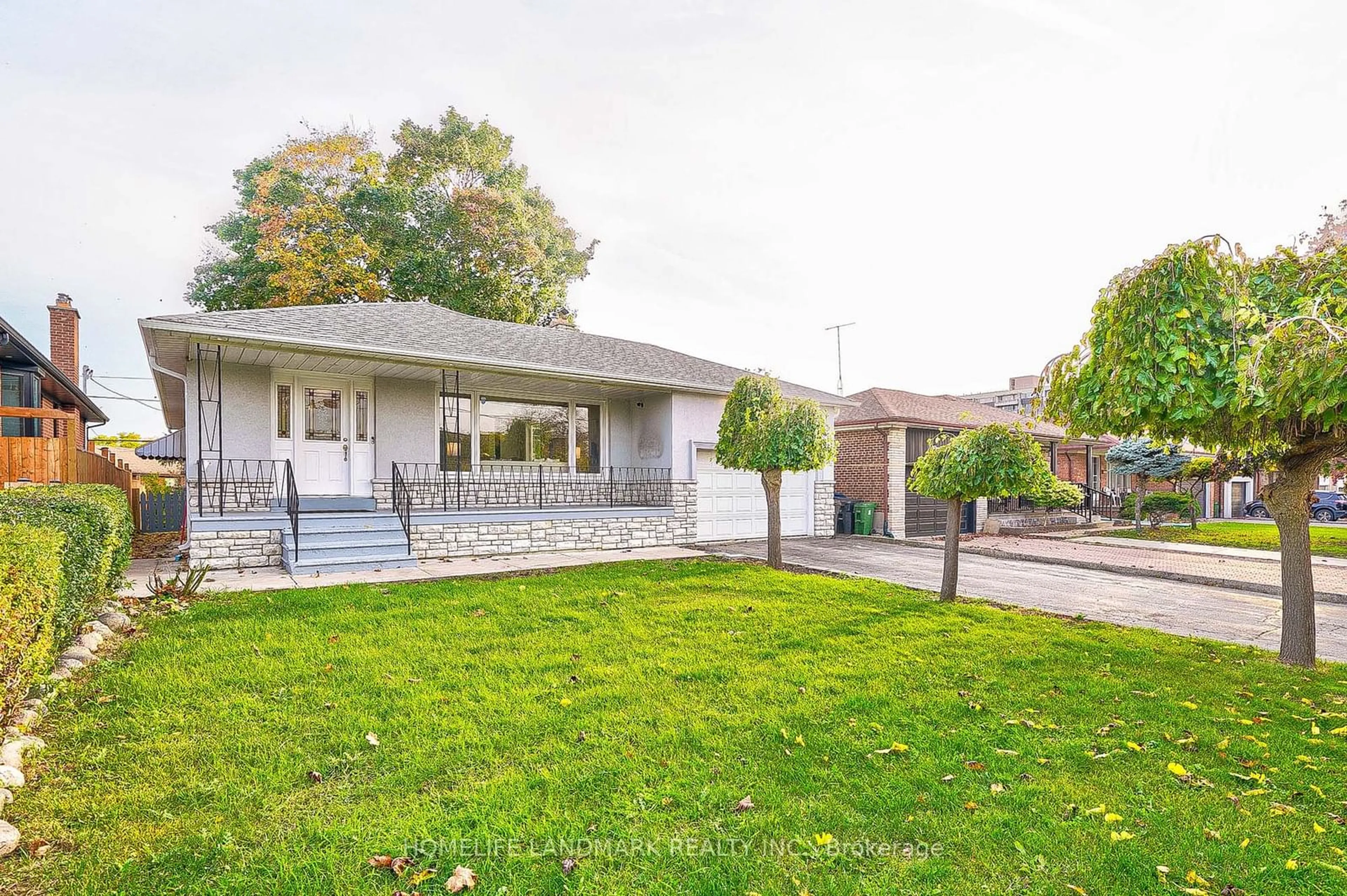 A pic from exterior of the house or condo, the fenced backyard for 373 The Westway, Toronto Ontario M9R 1H3