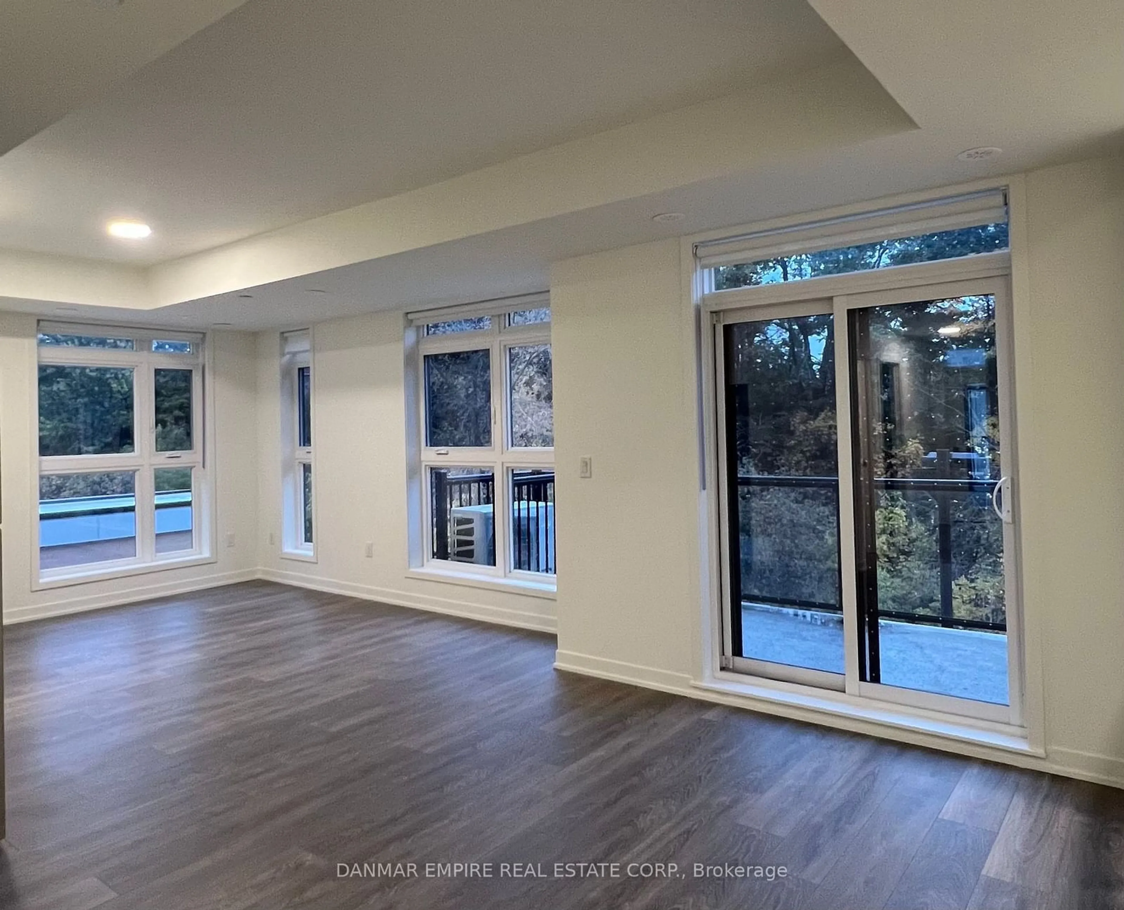 A pic of a room, wood floors for 155 Cannon Jackson Dr Dr #Q206, Toronto Ontario M6M 0B7