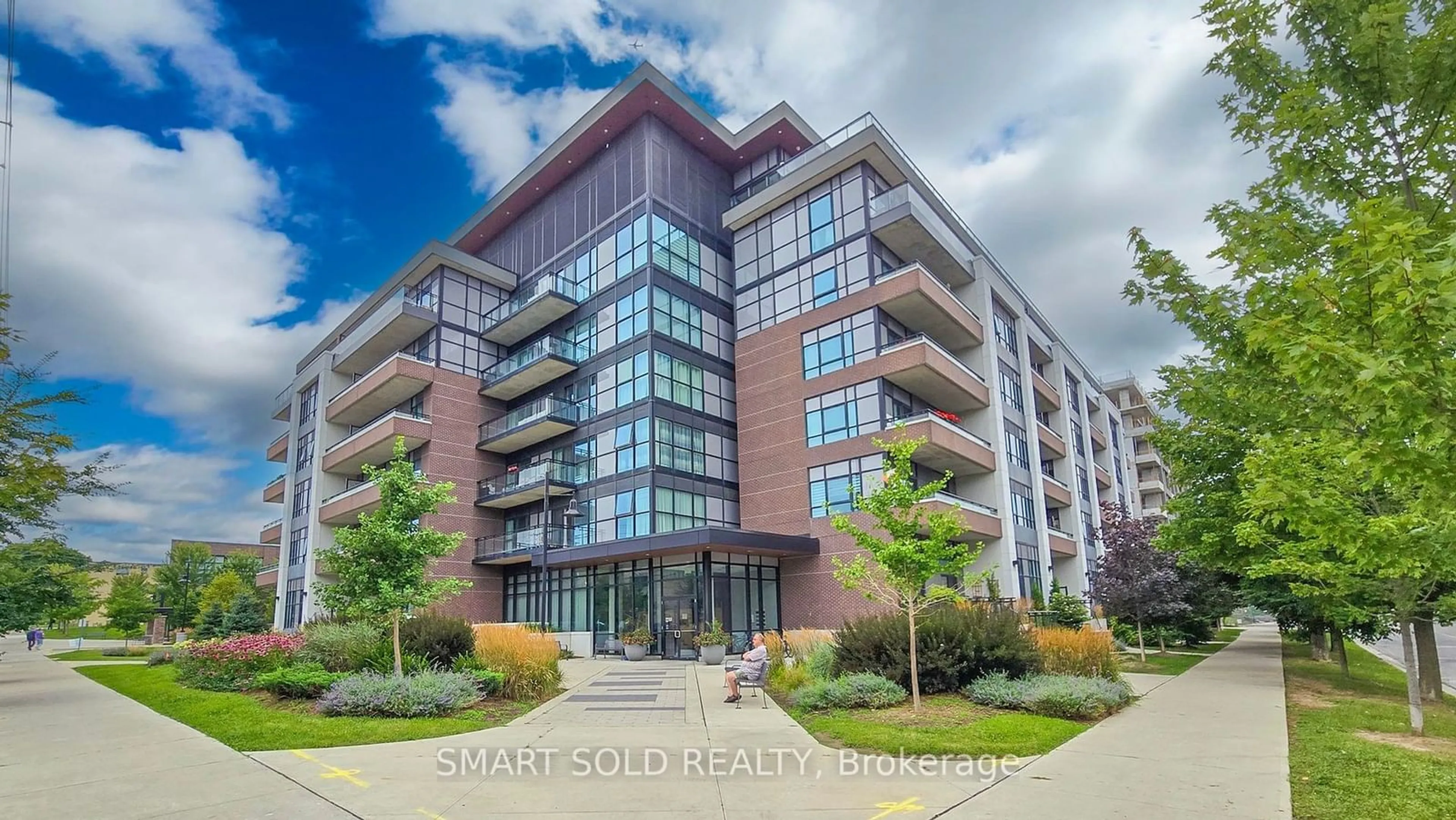 A pic from exterior of the house or condo, the front or back of building for 1 Neighbourhood Lane #214, Toronto Ontario M8Y 0C2