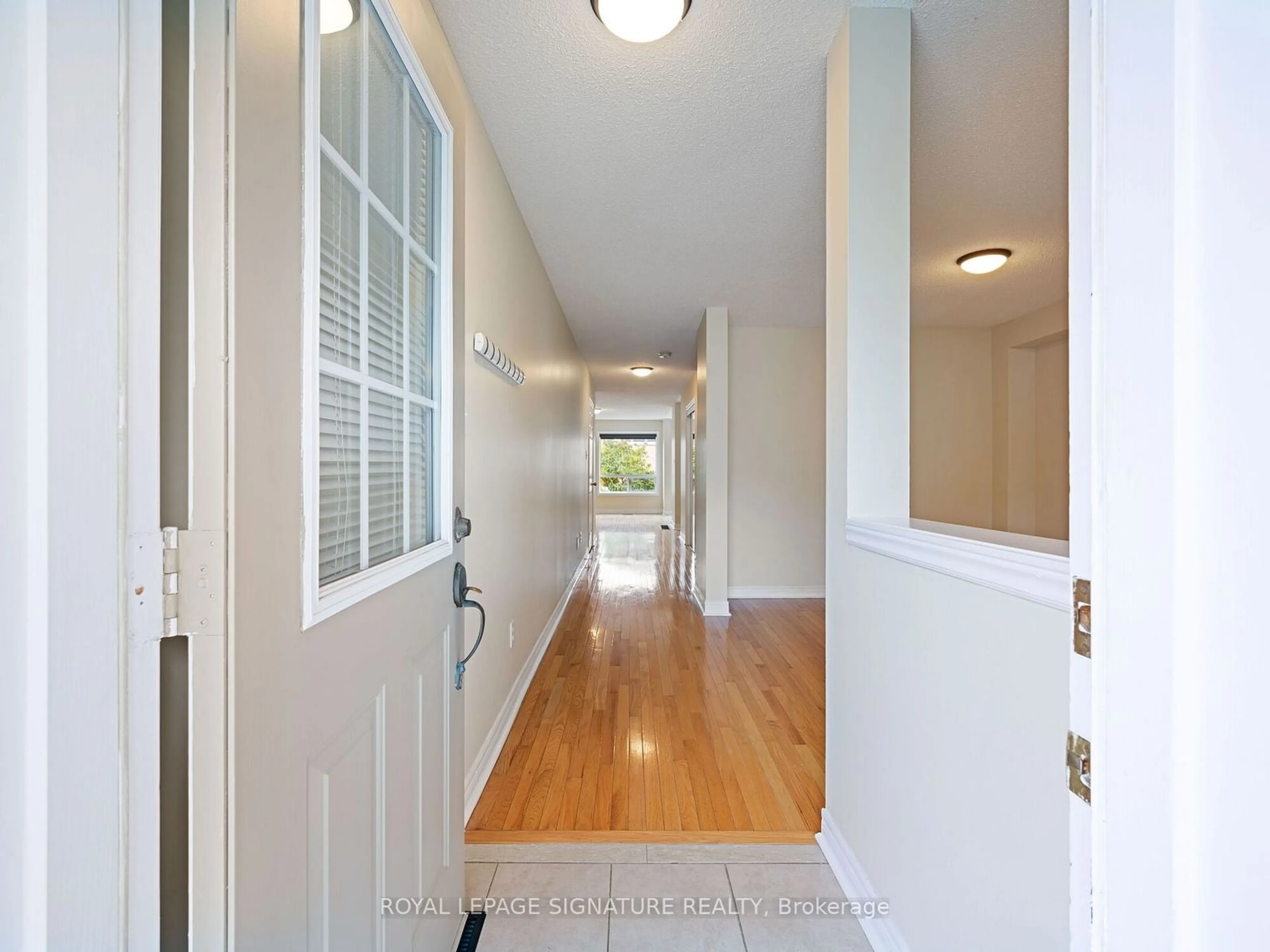 Indoor entryway, wood floors for 4909 James Austin Dr, Mississauga Ontario L4Z 4H5